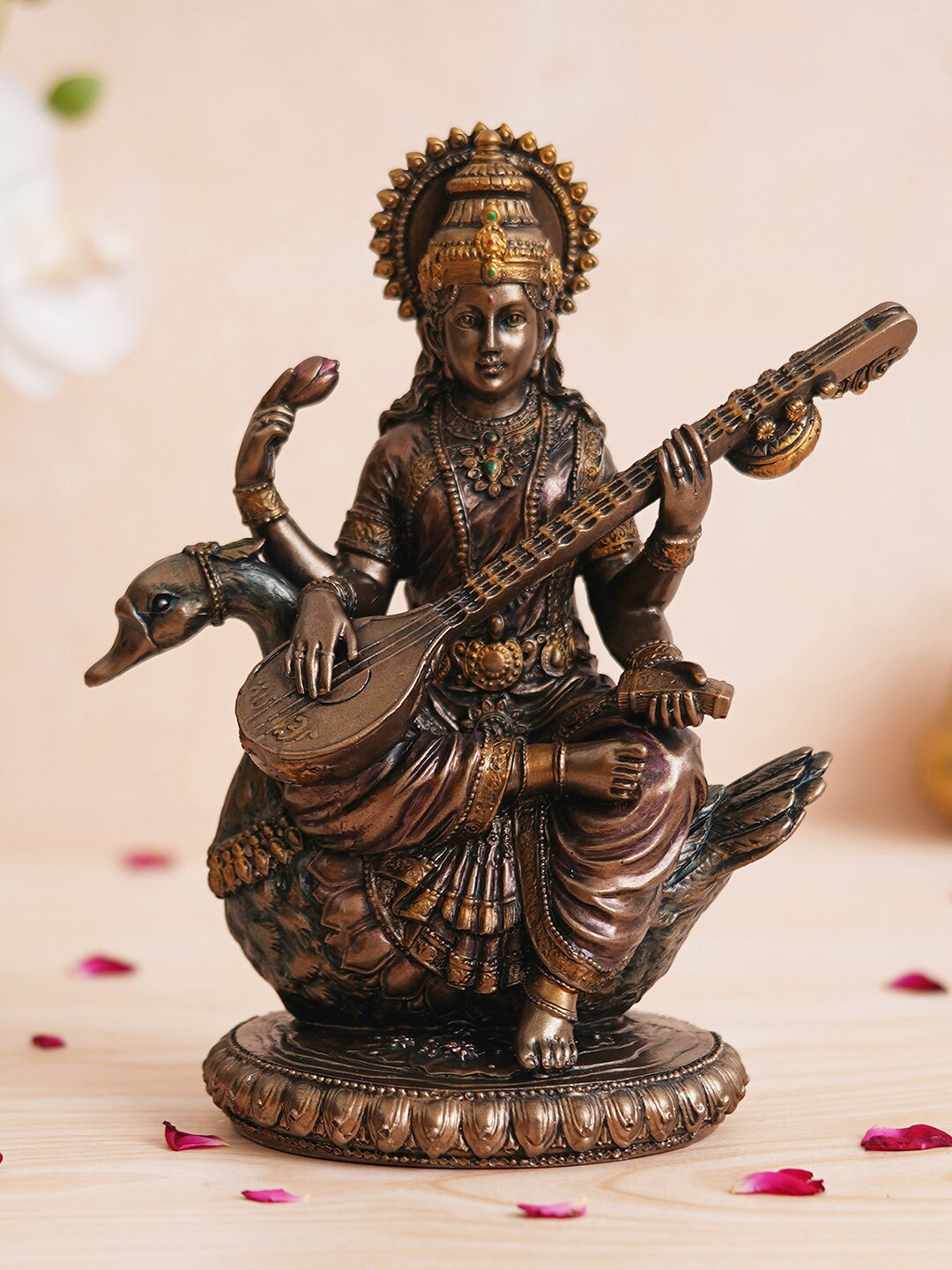 eCraftIndia Goddess Saraswati Sitting on Swan Playing Veena Brown Polyresin Natural Living Room Medium Showpiece - 4.5 Inches