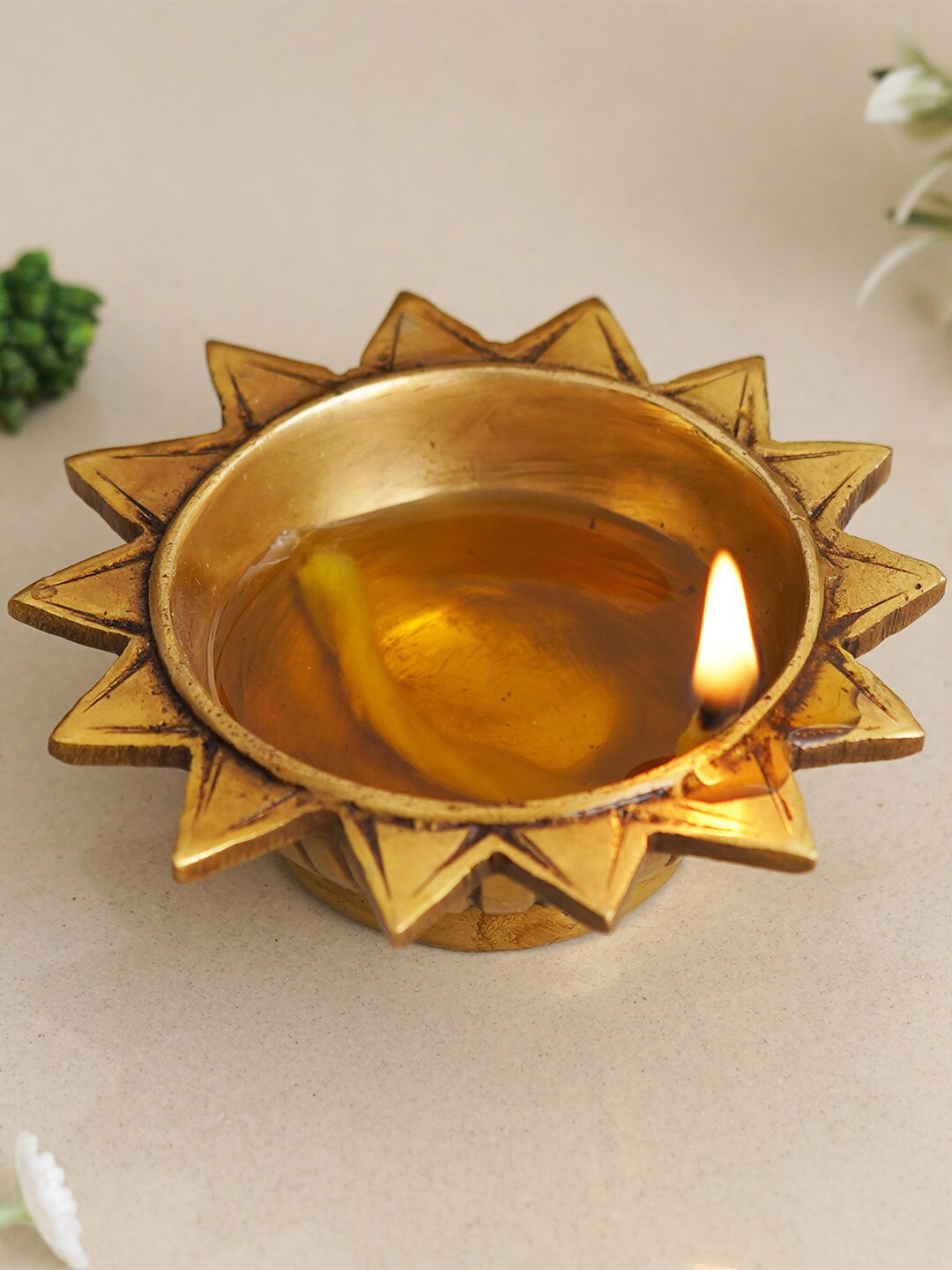 eCraftIndia Beige Sun Shaped Decorative Diya