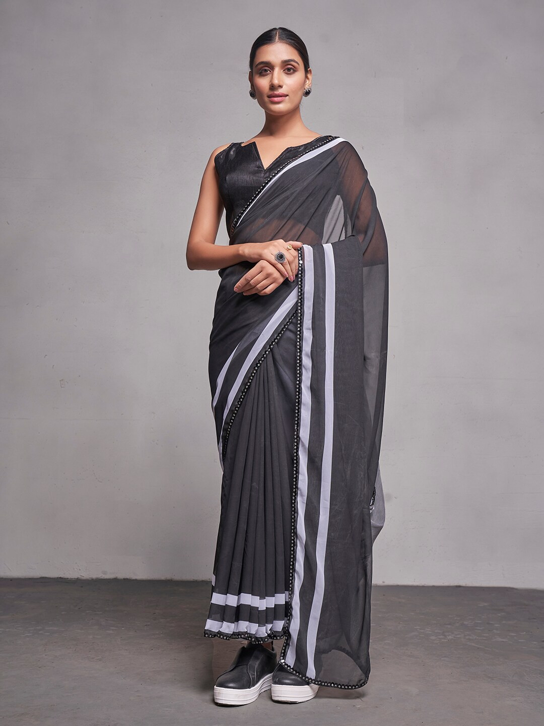 Kalista Striped Printed Black Georgette Saree with Lace Border