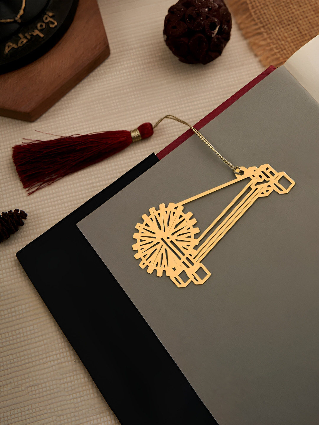 DecorTwist Brass Charkha Design Bookmark