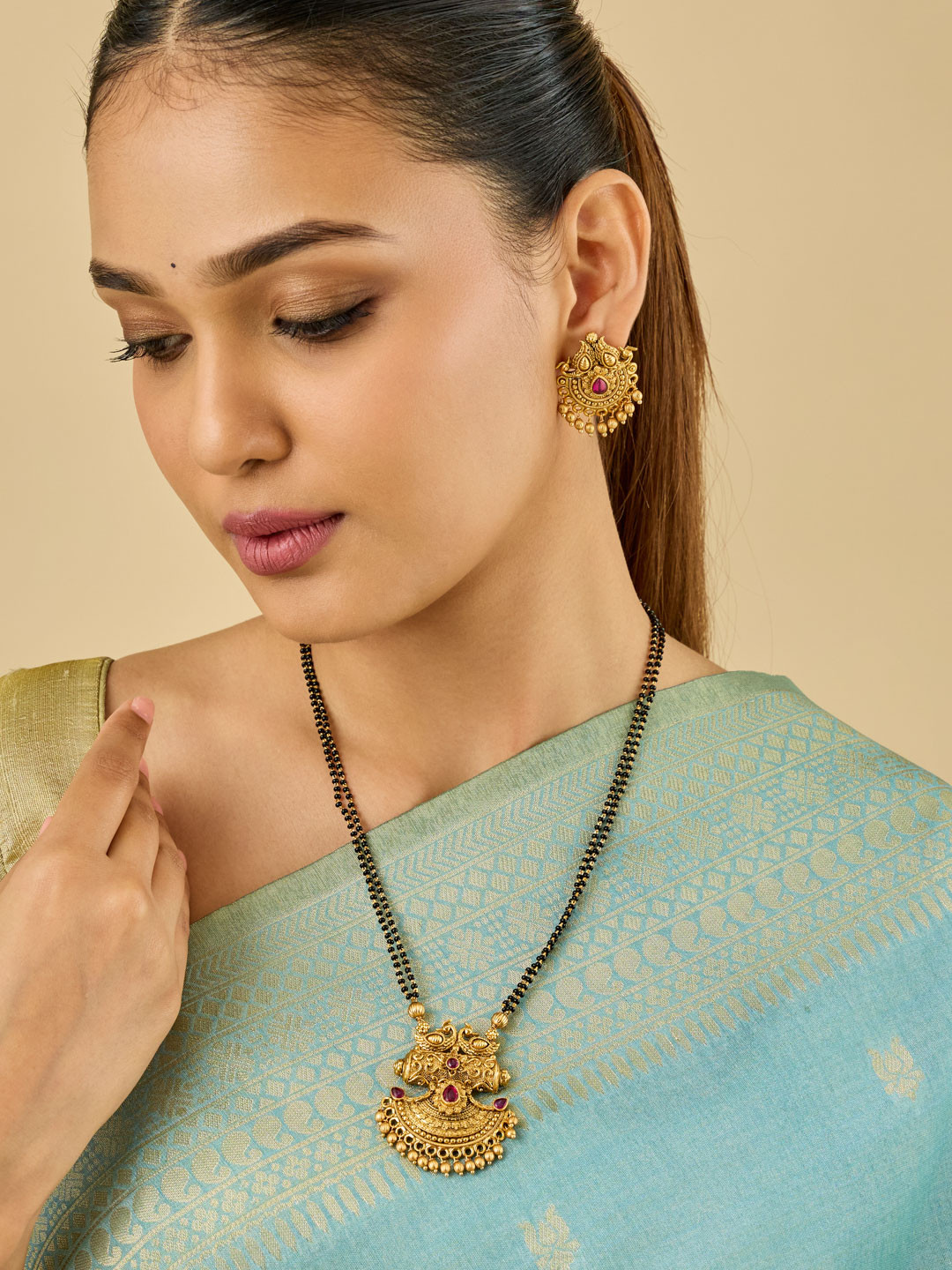 Kushal's Fashion Jewellery  Antique Stone-Studded & Black Beaded Mangalsutra & Earring