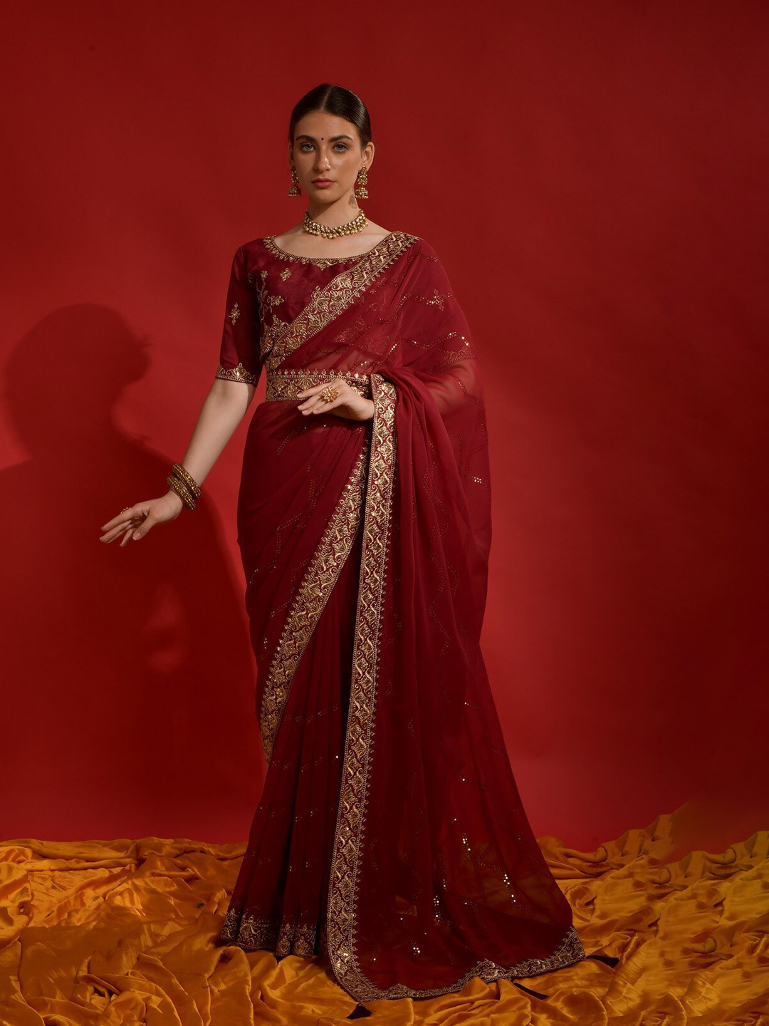 Mitera Maroon & Gold Toned Zari Pure Georgette Saree