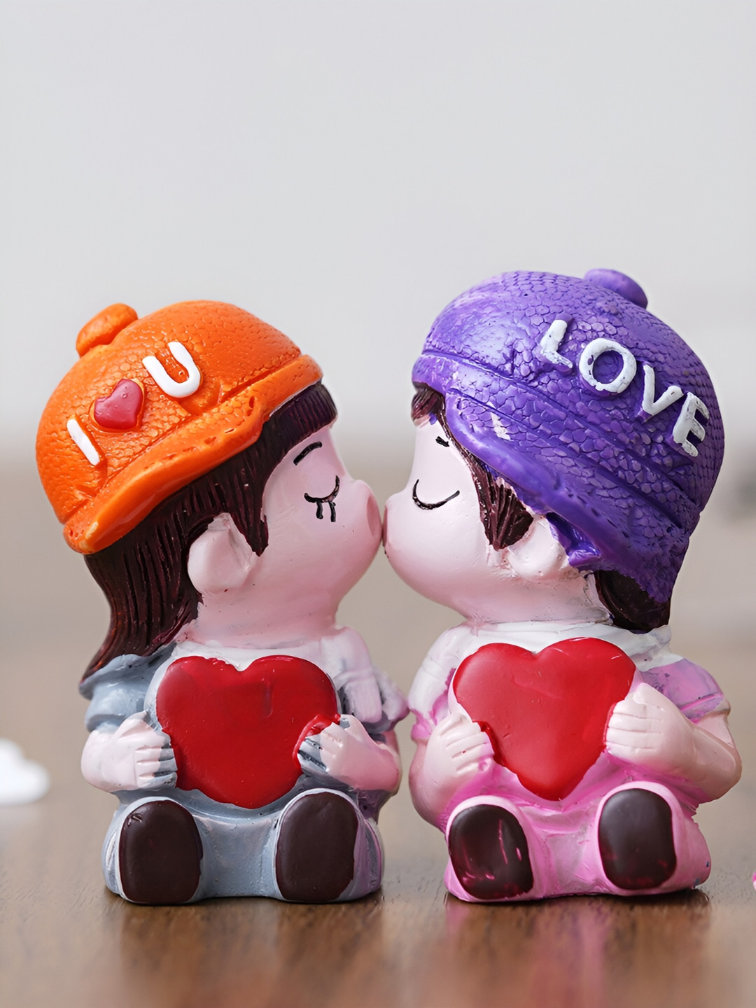 eCraftIndia Boy and Sweet Girl Cute Couple Kissing Purple Polyresin Natural Living Room Medium Showpiece - 2.2 Inches