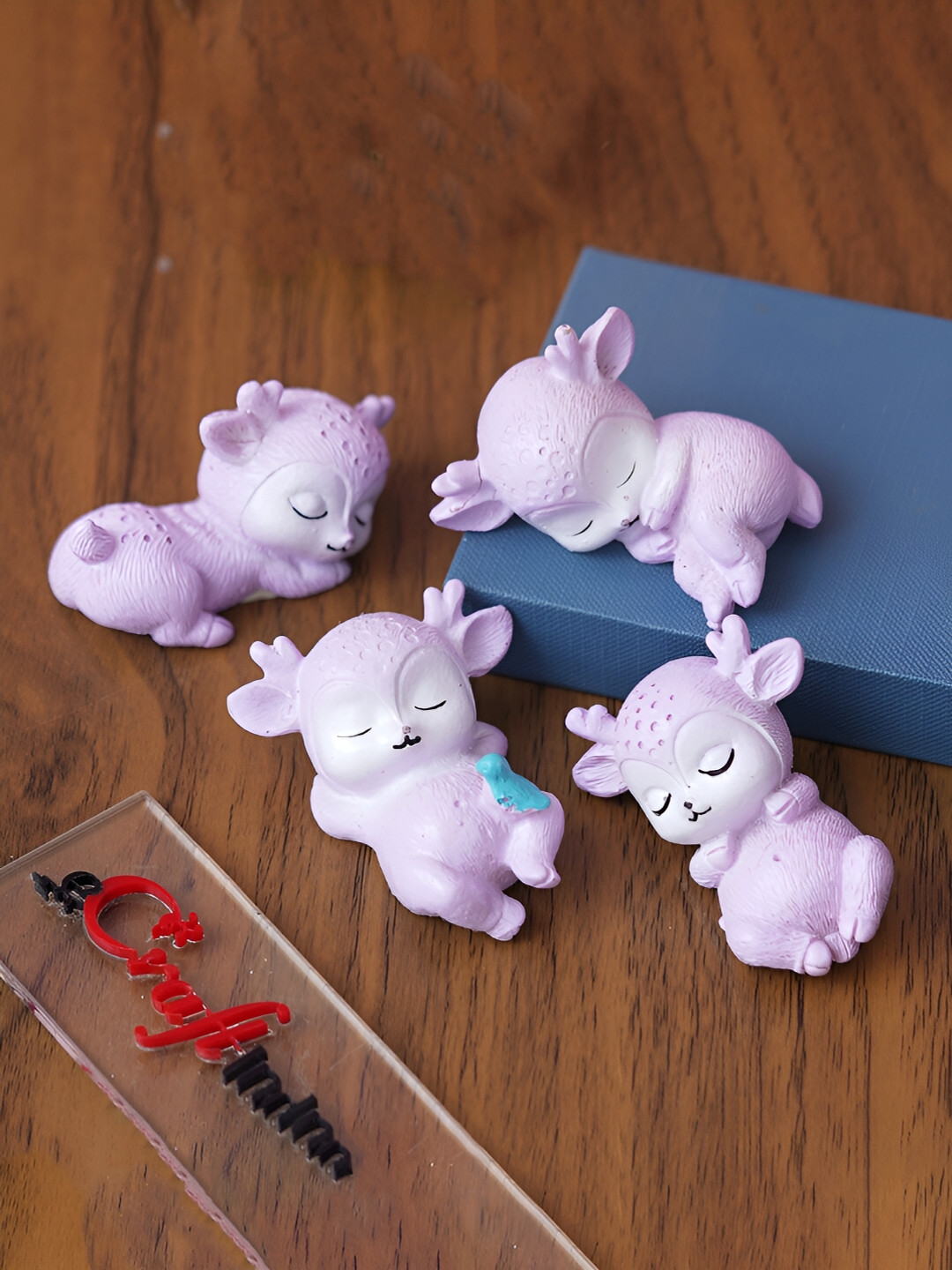 eCraftIndia Cute Sleeping Deer Lavender Polyresin Glossy Kid Room Set of 4 Medium Showpieces - 2.4 Inches