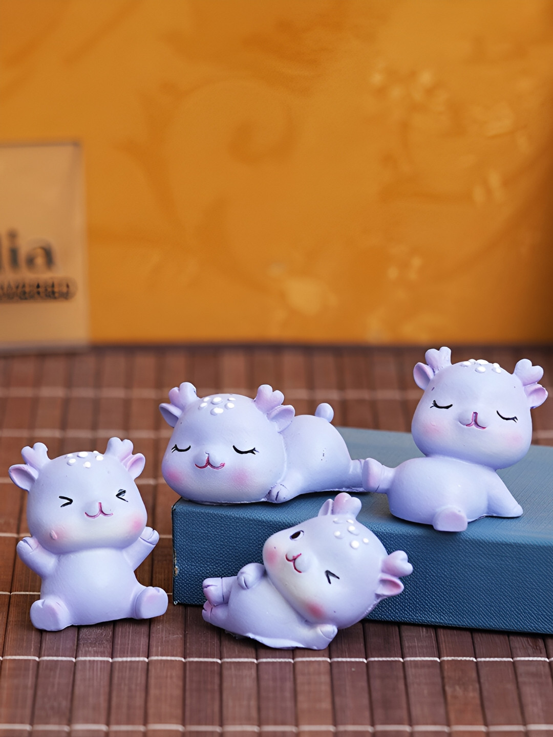 eCraftIndia Cute Deer Lavender Polyresin Natural Living Room Set of 4 Medium Showpieces - 2 Inches