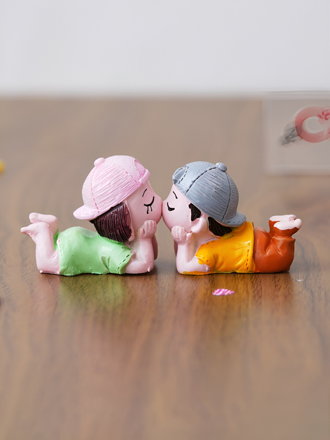 eCraftIndia Cute Kissing Couple Orange Polyresin Glossy Bedroom Medium Showpiece - 1.8 Inches