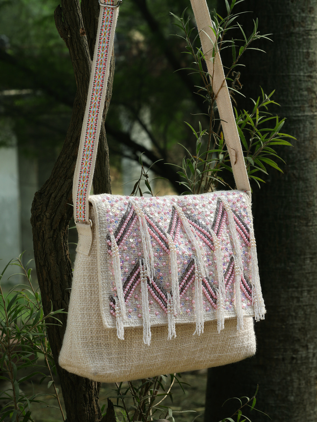 Anekaant Embellished Lace Sling Bag with Tasselled