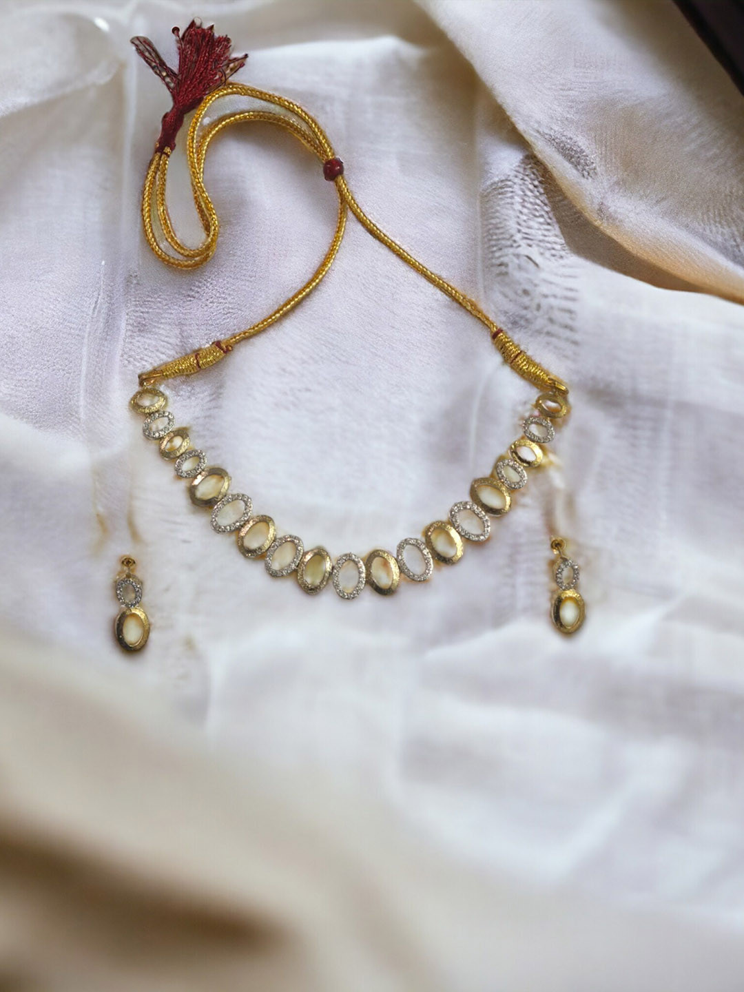 The Pari Rhodium-Plated American Diamond-Studded Necklace And Earrings