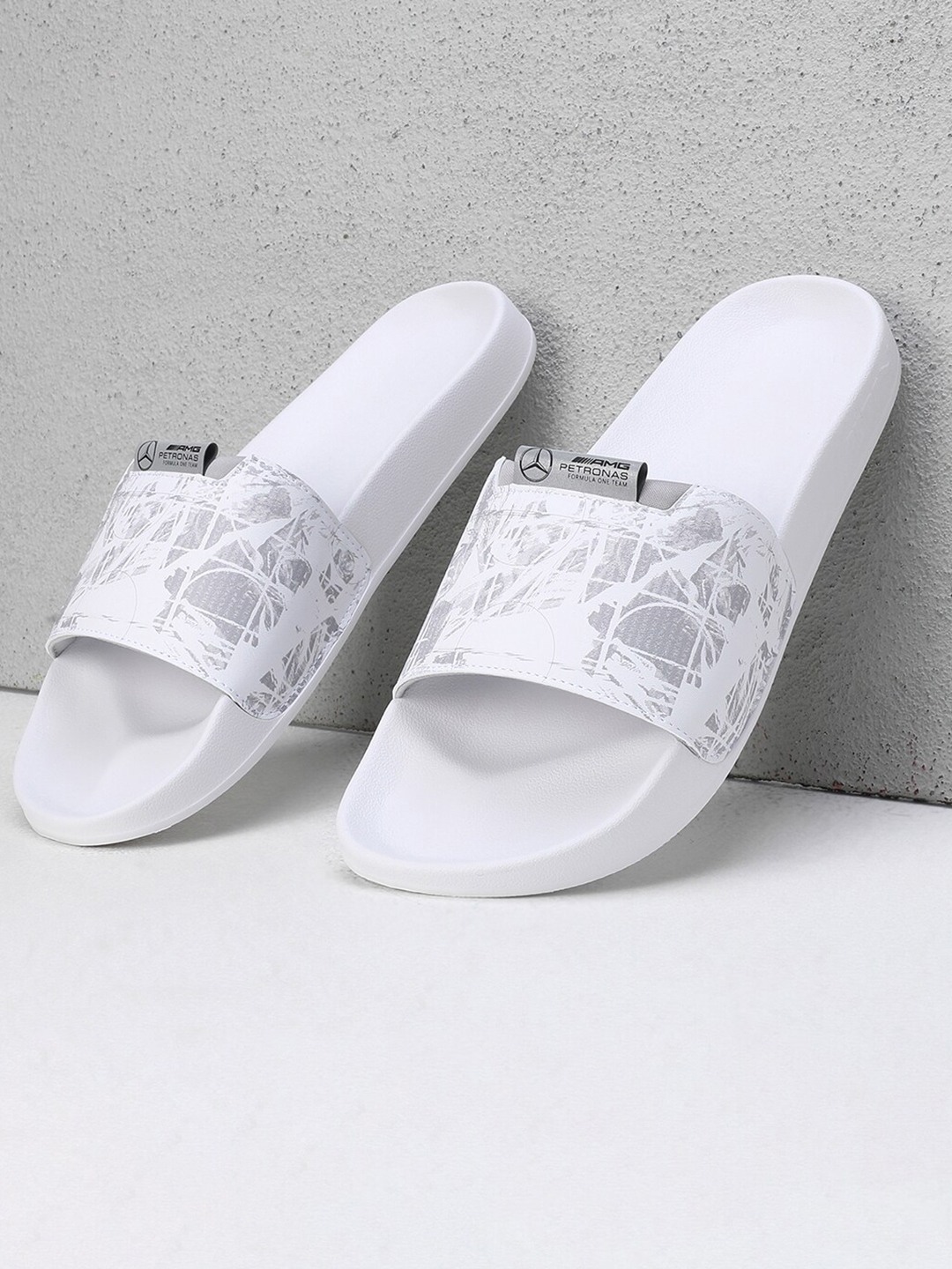 Buy Puma Men Mercedes AMG Petronas Leadcat 2.0 Sliders Flip Flops for Men 27126826 Myntra
