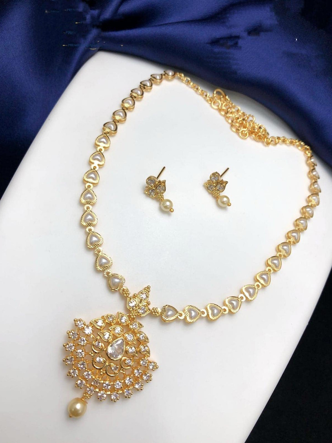 Adc fashions Gold-Plated Stones Studded & Pearls Beaded Jewellery Set