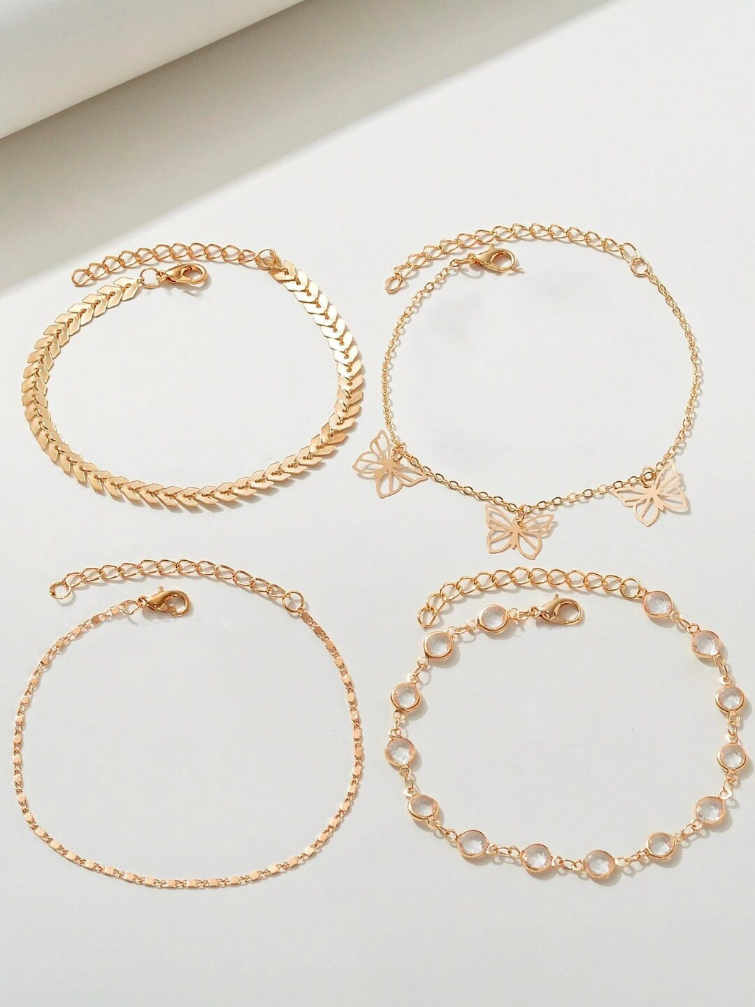 OOMPH Set Of 4  Butterfly Charm Fashion Anklets