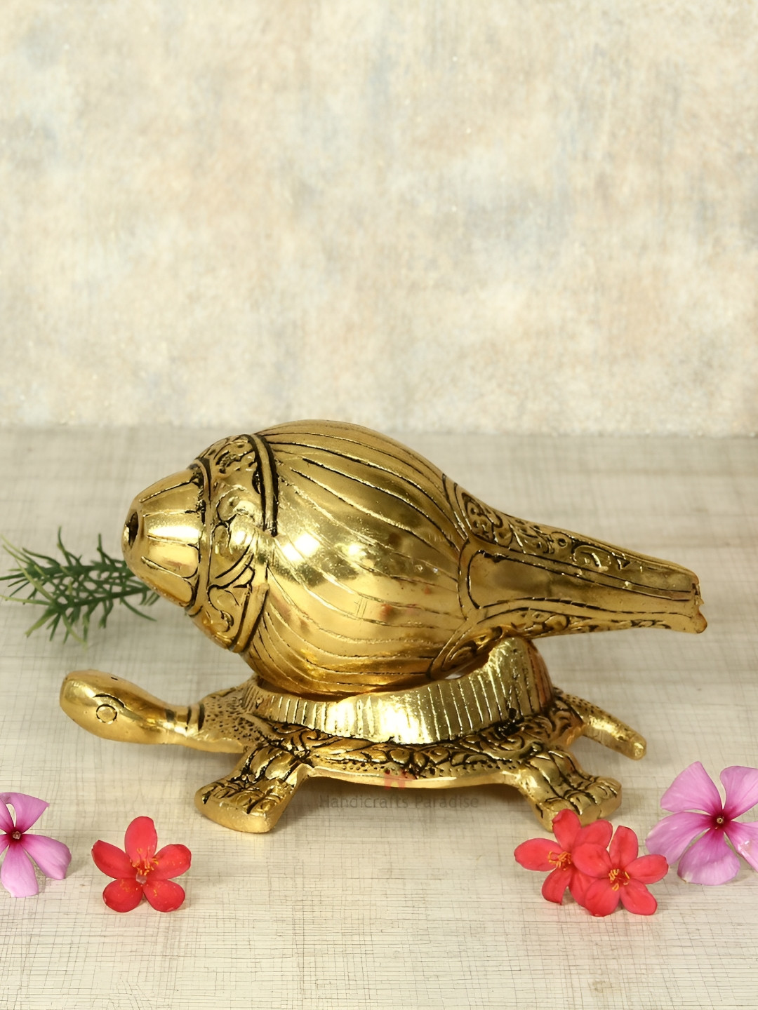 HANDICRAFTS PARADISE Gold Toned Shank on Tortoise Base Metal Religious Idol Showpiece