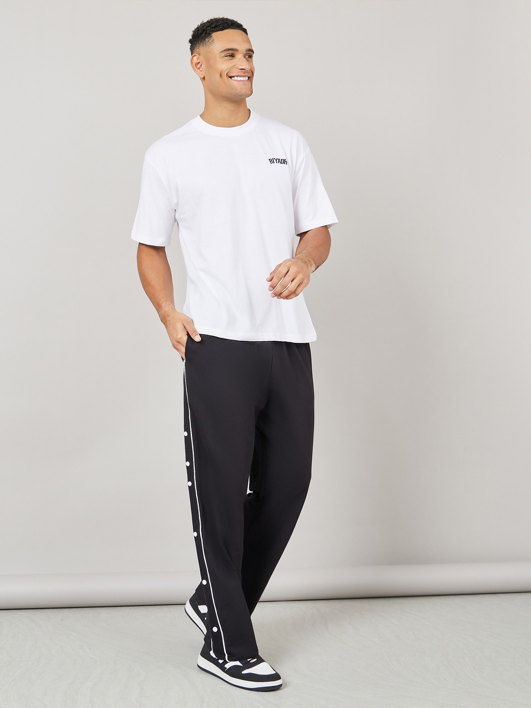 Buy Styli Men Contrast Piping and Popper Oversized Open Hem Jogger Track Pants for Men 27171598 Myntra