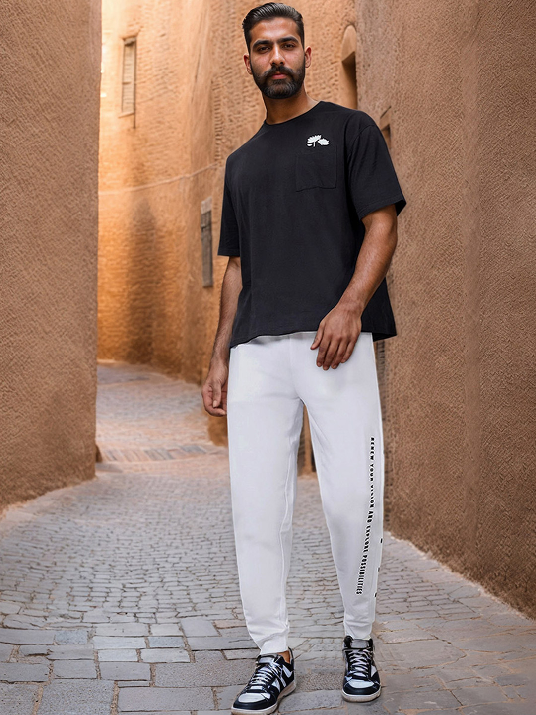 Styli Men Oversized Side Vertical Print and Popper Detail Joggers