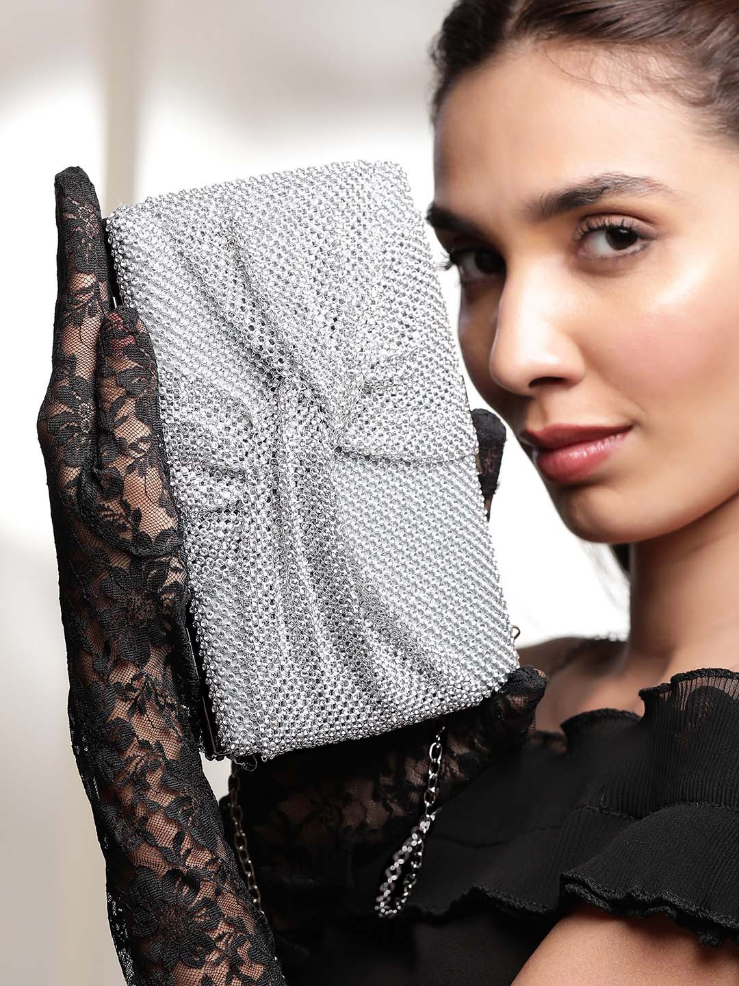 Rubans Silver Tone Crystal CZ Studded Luxury Clutch with Knot Detail and Metallic Clasp