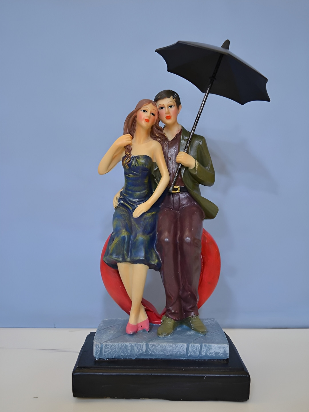 CraftVatika Blue & Black Couple Sitting Heart Shape Home Decorative Figurine Showpiece