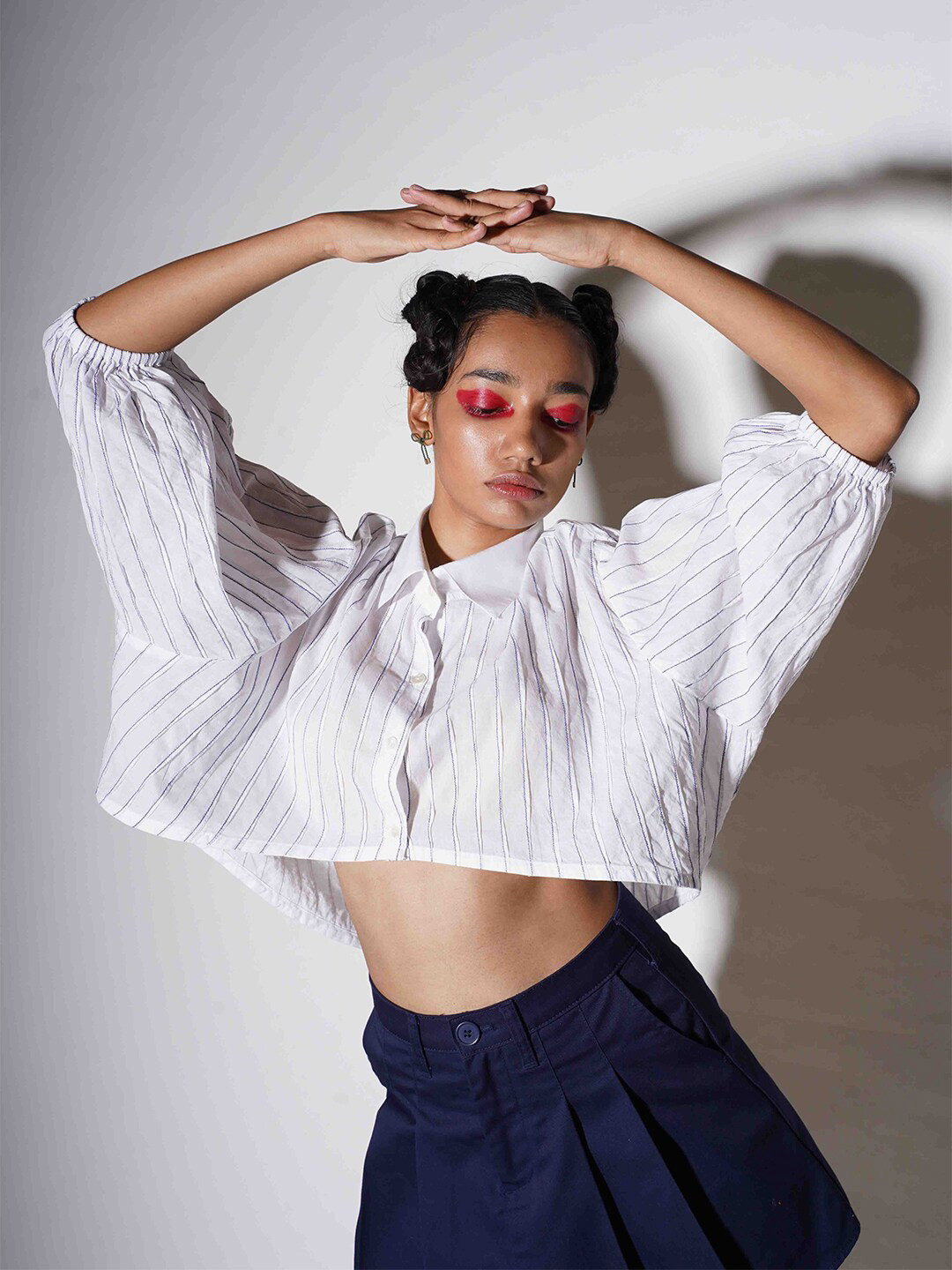 Ostilos Vertical Stripes Spread Collar Drop-Shoulder Sleeves High-Low Boxy Cotton Shirt