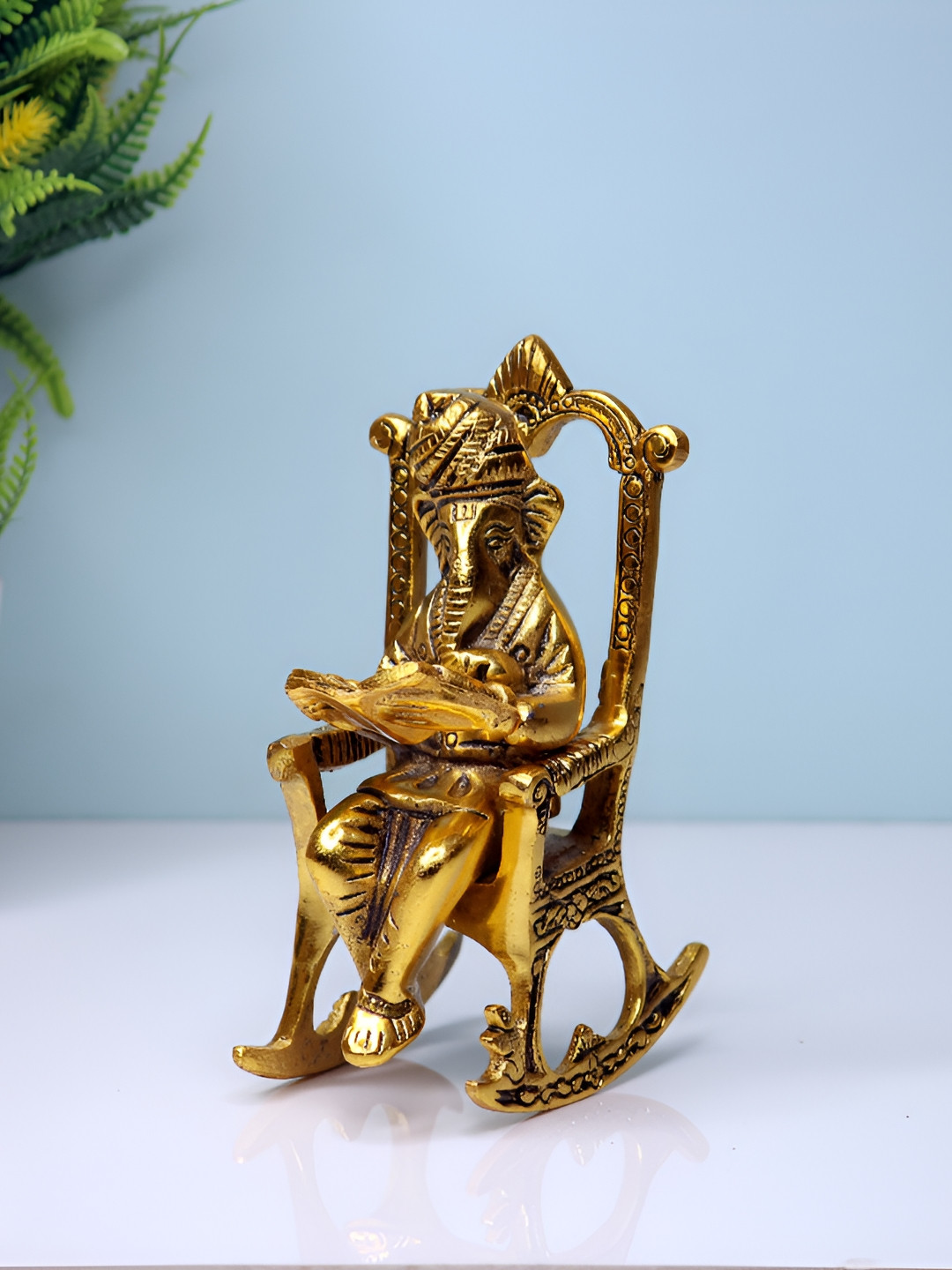 Navyaksh Ganesh Ji Sitting on Chair Gold Aluminium Metallic Prayer Room Small Showpiece -