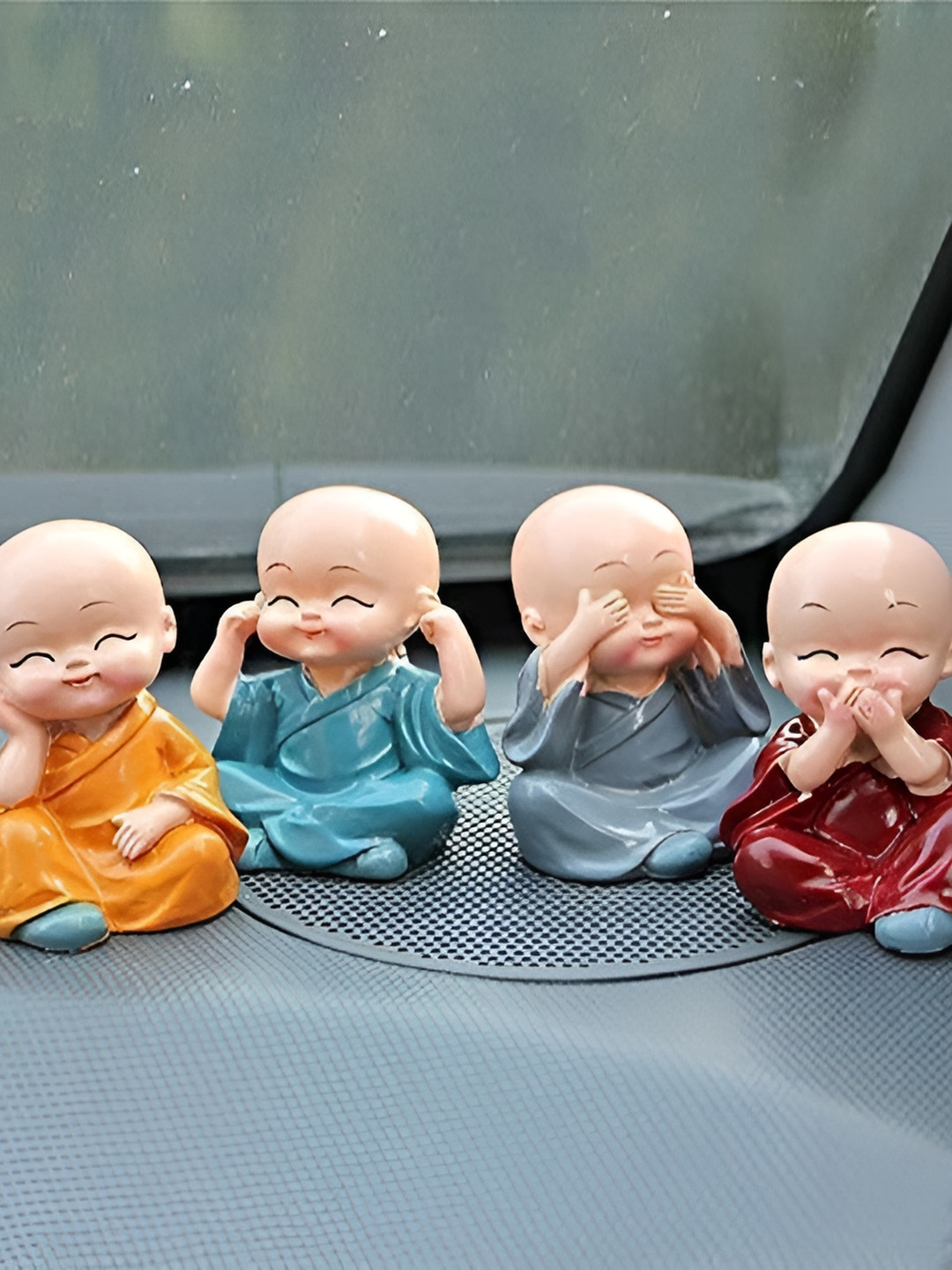 Navyaksh Budha Monk Orange Polyresin Glossy Home Office Set of 4 Small Showpieces - 1.4 Inches