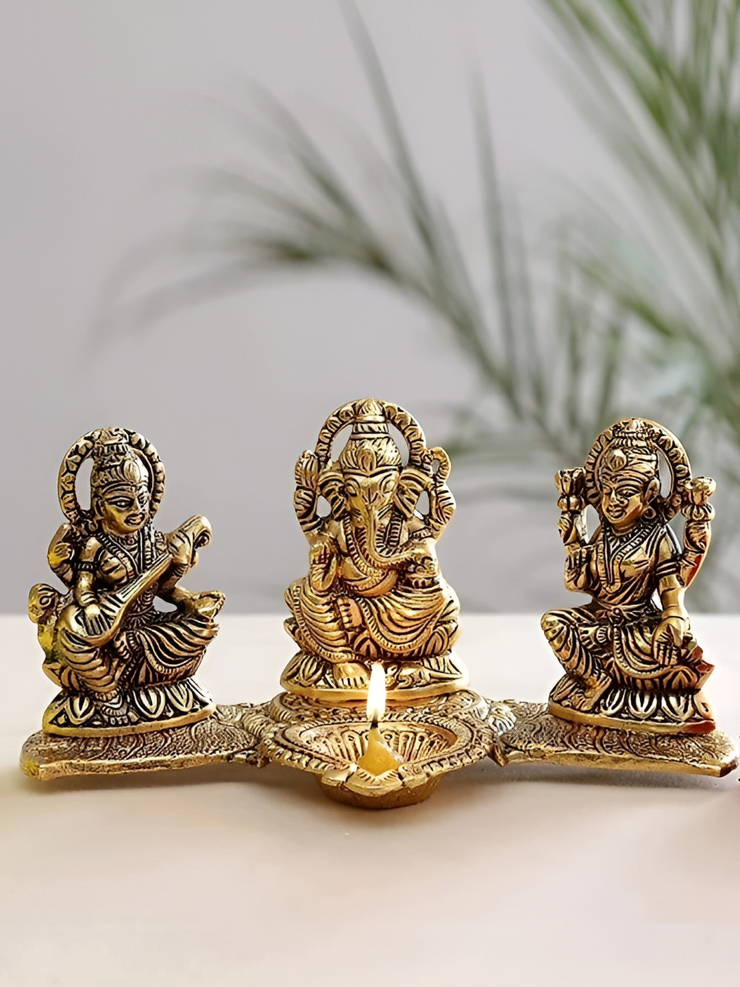 Navyaksh Lakshmi Ganesh and Saraswathi Gold Metal Metallic Prayer Room Small Showpiece - 4.3 Inches