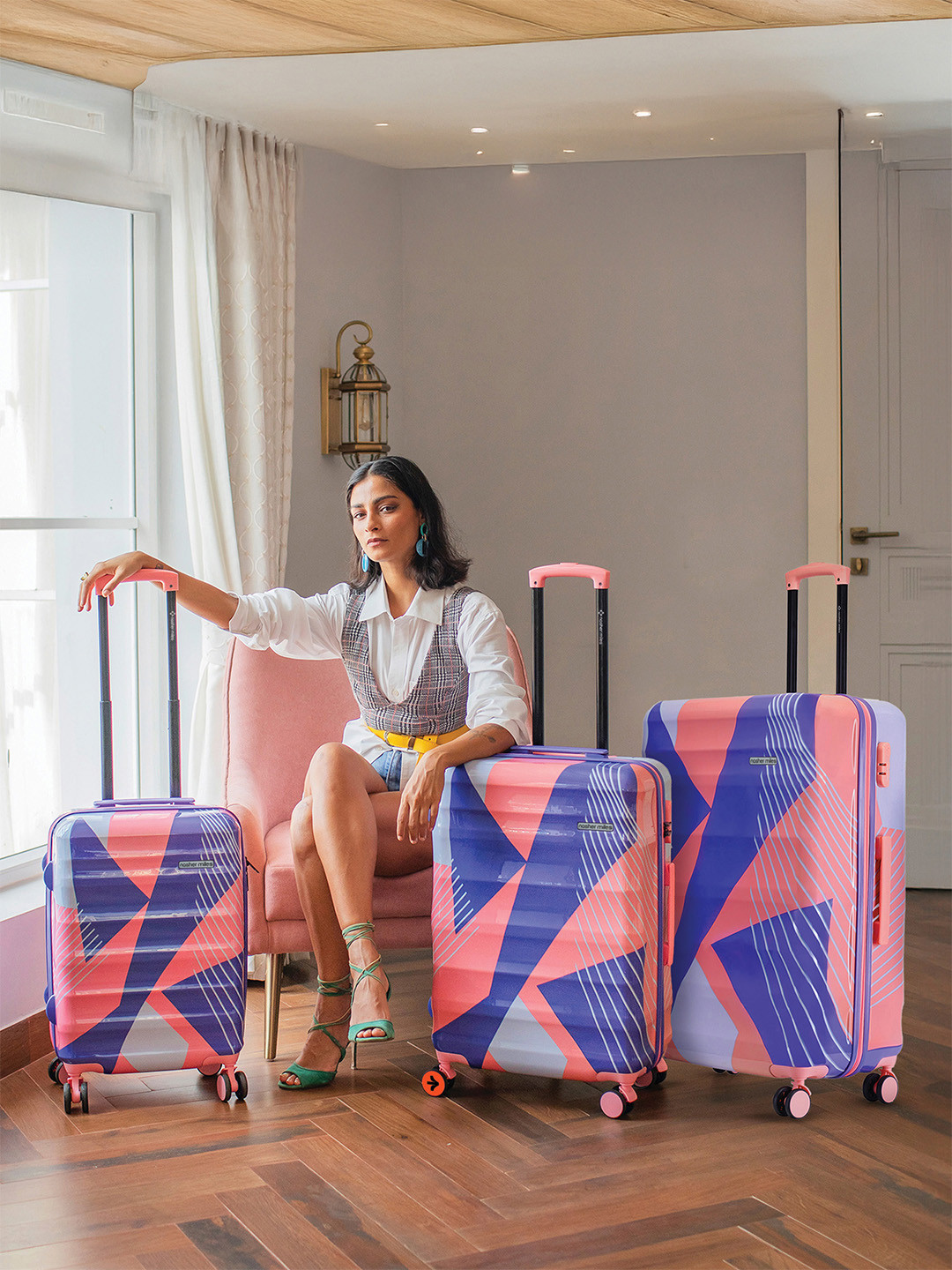 Nasher Miles Chicago Hard Polycarbonate Set of 3 S/M/L Pink-Grey Trolley Bags 55-65-75cm