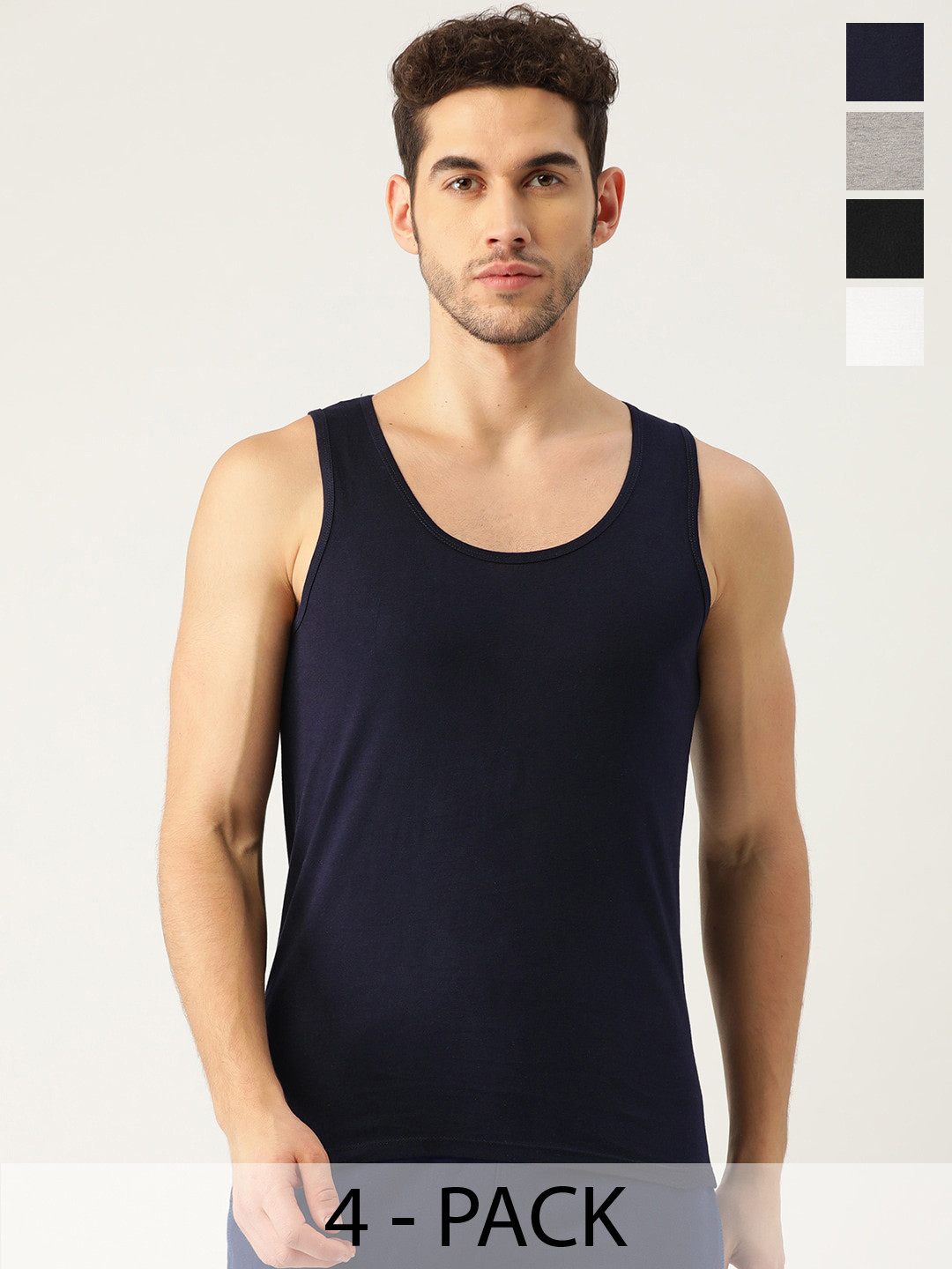 The Roadster Lifestyle Co. Pack Of 4 Pure Cotton Innerwear Vests RD-CSVP-6001-WH-NB-MG-BLK