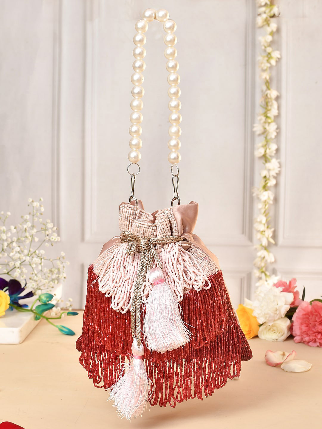 Voylla Embellished Tasselled Potli Clutch