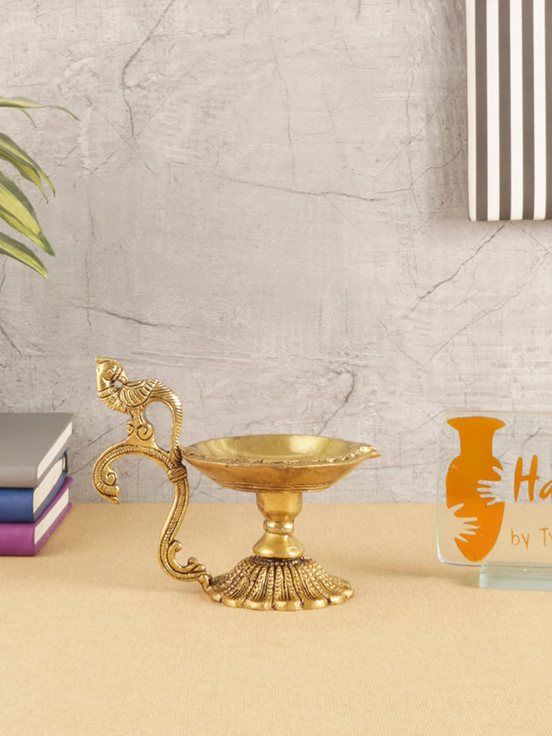 Two Moustaches Yellow Curved Peacock Handle Diya