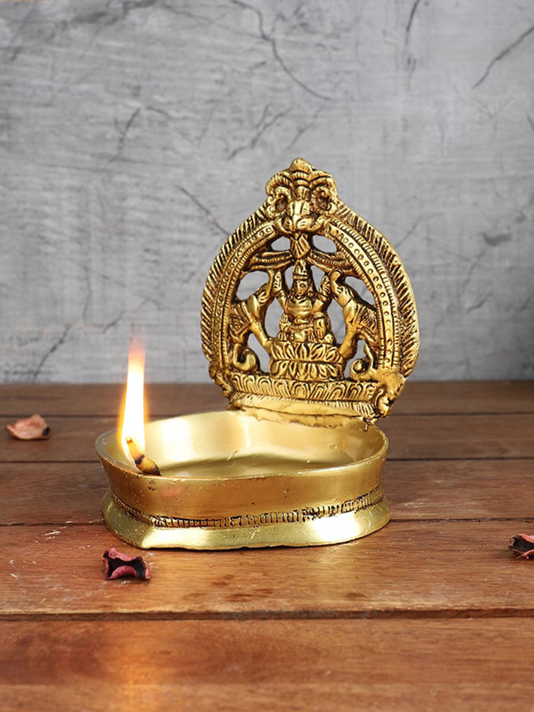 Two Moustaches Gold Toned Laxmi With Elephant Frame Design Brass Diya