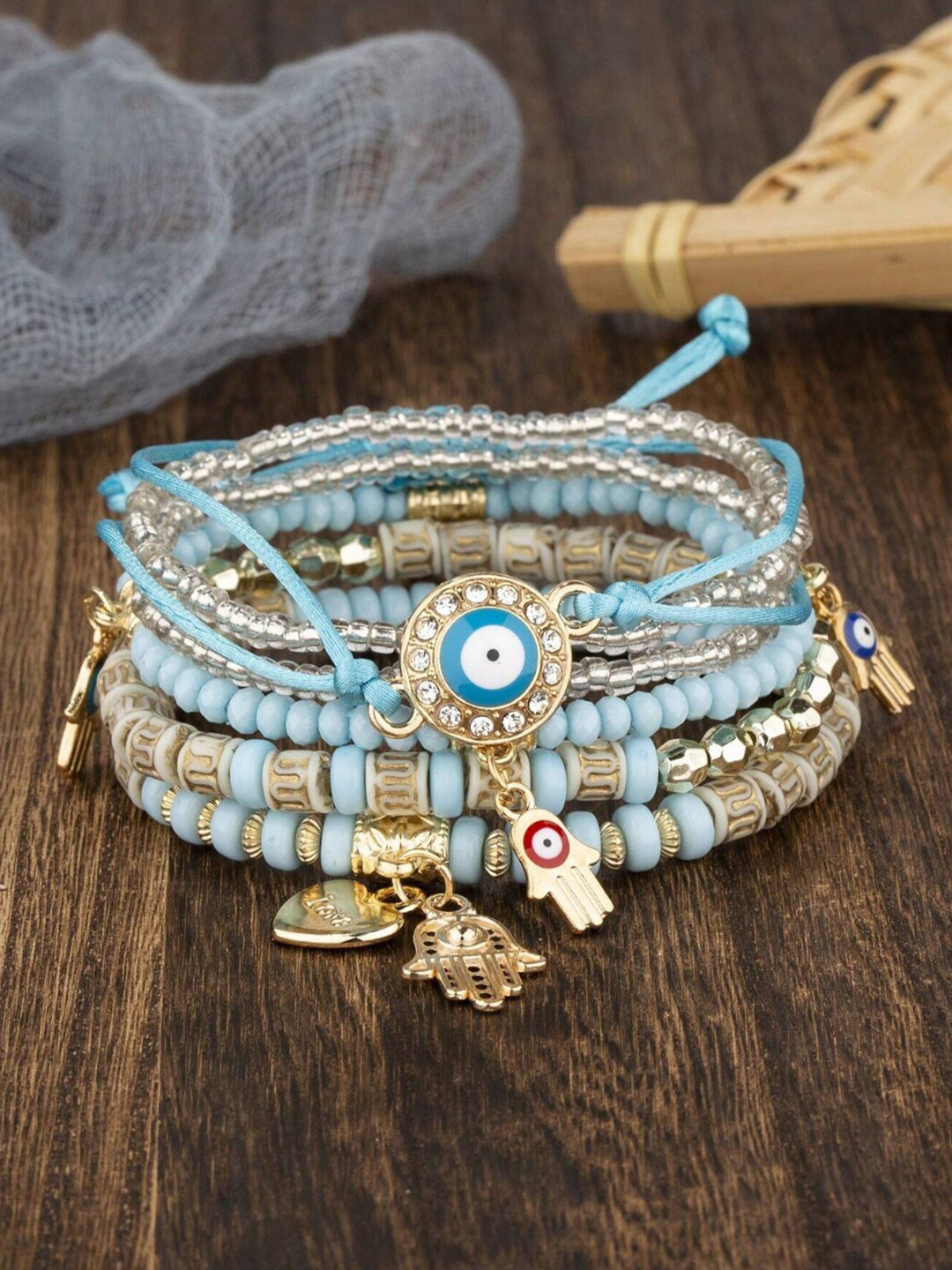 DressBerry Gold-Toned Set Of 6 Multi layer Lucky Evil Eye Elasticated Bracelet