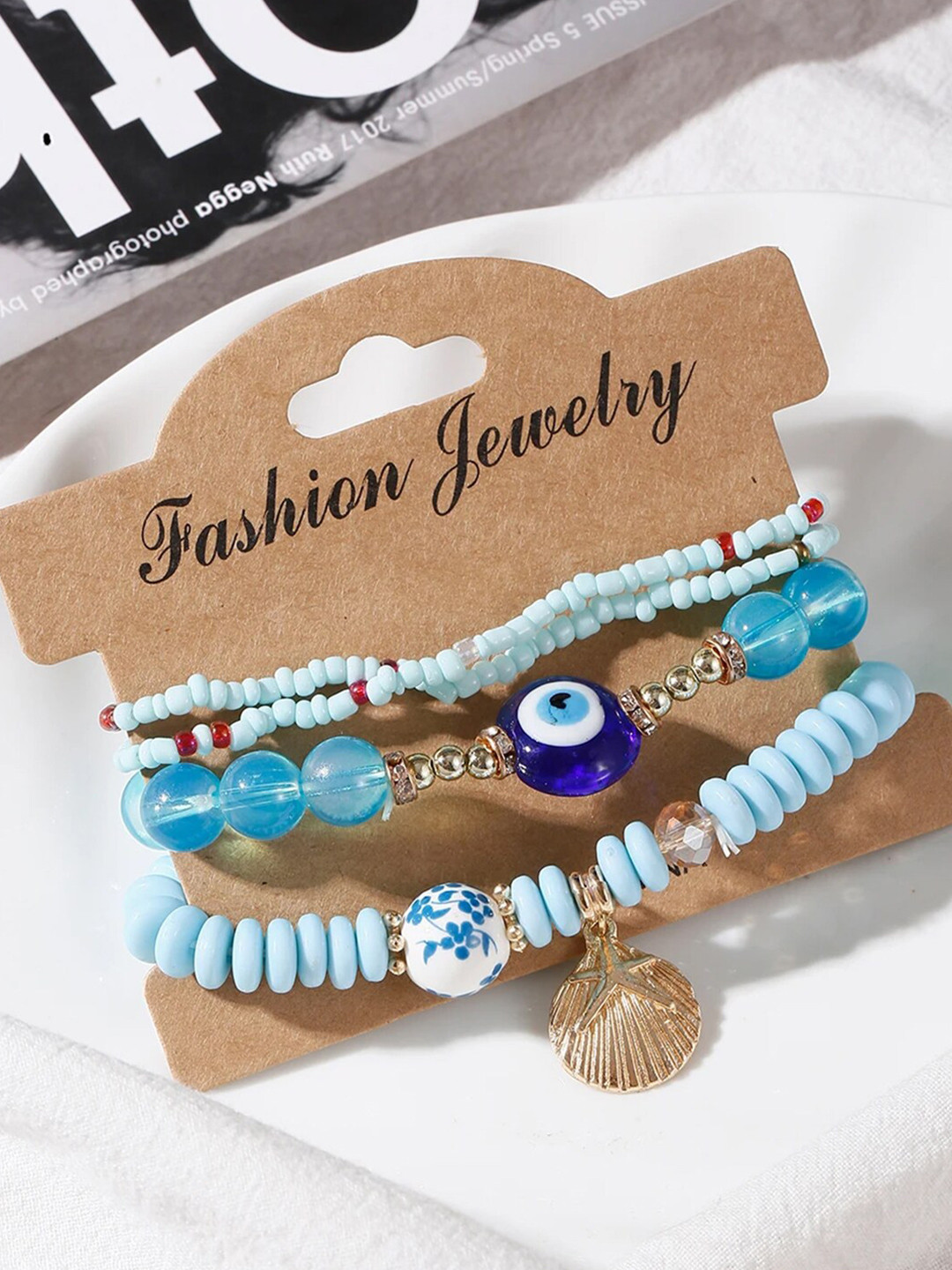 DressBerry Gold-Toned Set Of 4 Multi layer Lucky Evil Eye Elasticated Bracelet
