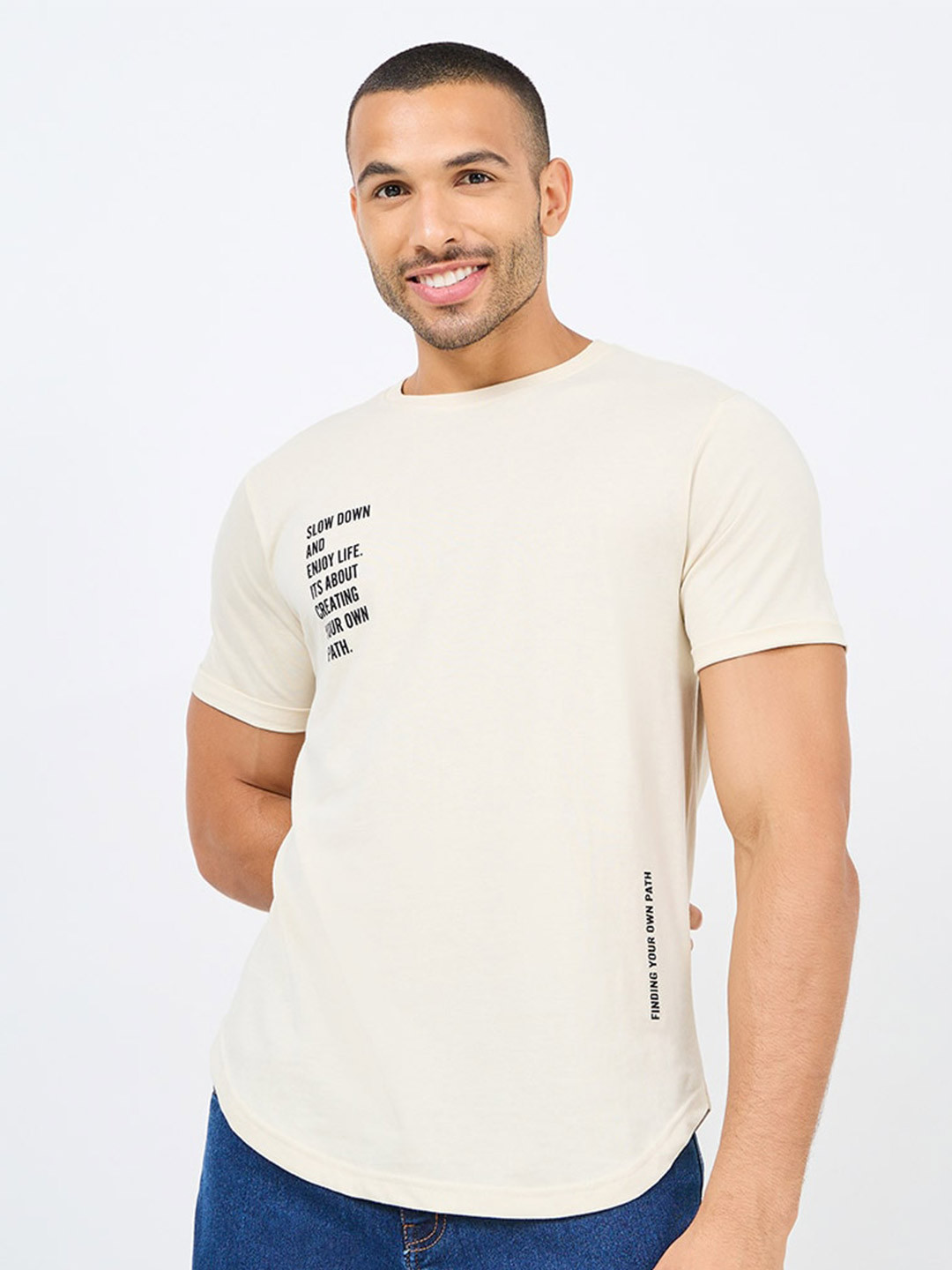 Styli Cream Coloured Typography Printed Curved Hem T-shirt