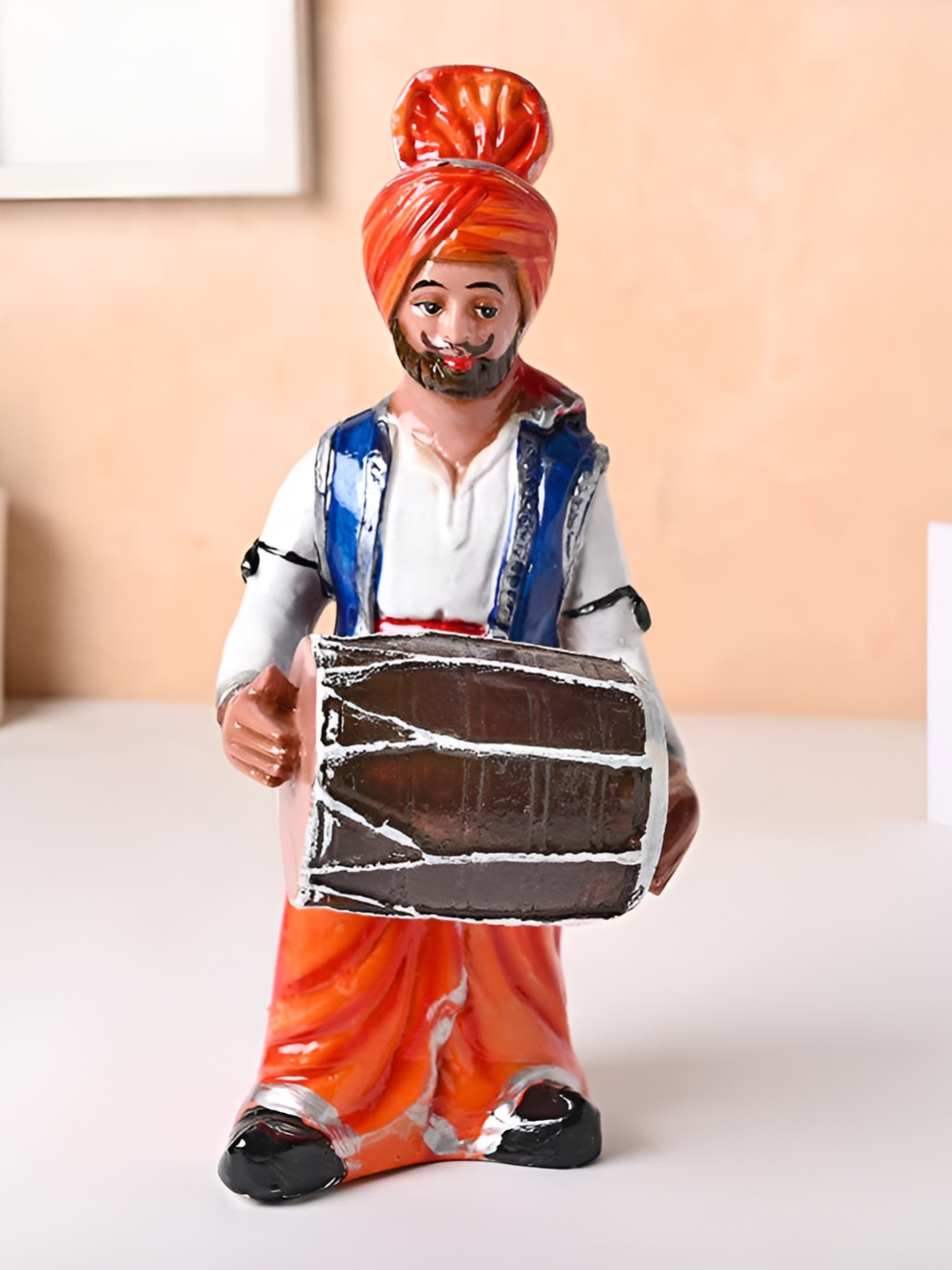 Floweraura Blue & White Punjabi Men with Dholak Figurine Showpiece