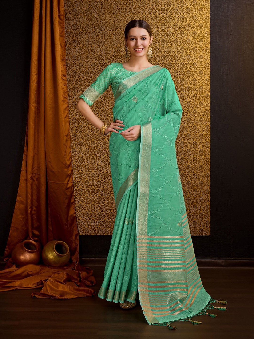 Mitera Teal Green Floral Embroidered Linen & Silk Saree
