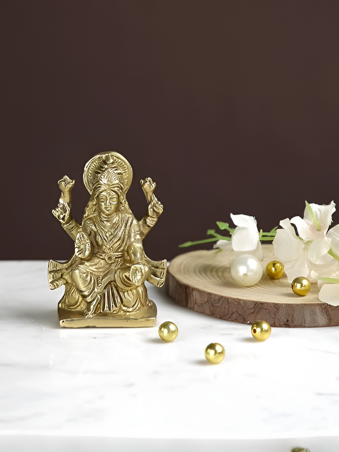 CraftVatika Goddess Lakshmi Sitting Posture Gold Brass Metallic Prayer Room Medium Showpiece - 6.4 Inches