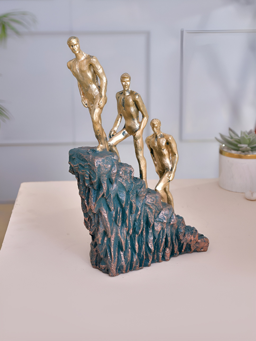 CraftVatika Statue of 3 Man on Stairs Gold Polyresin Natural Living Room Medium Showpiece - 10.2 Inches