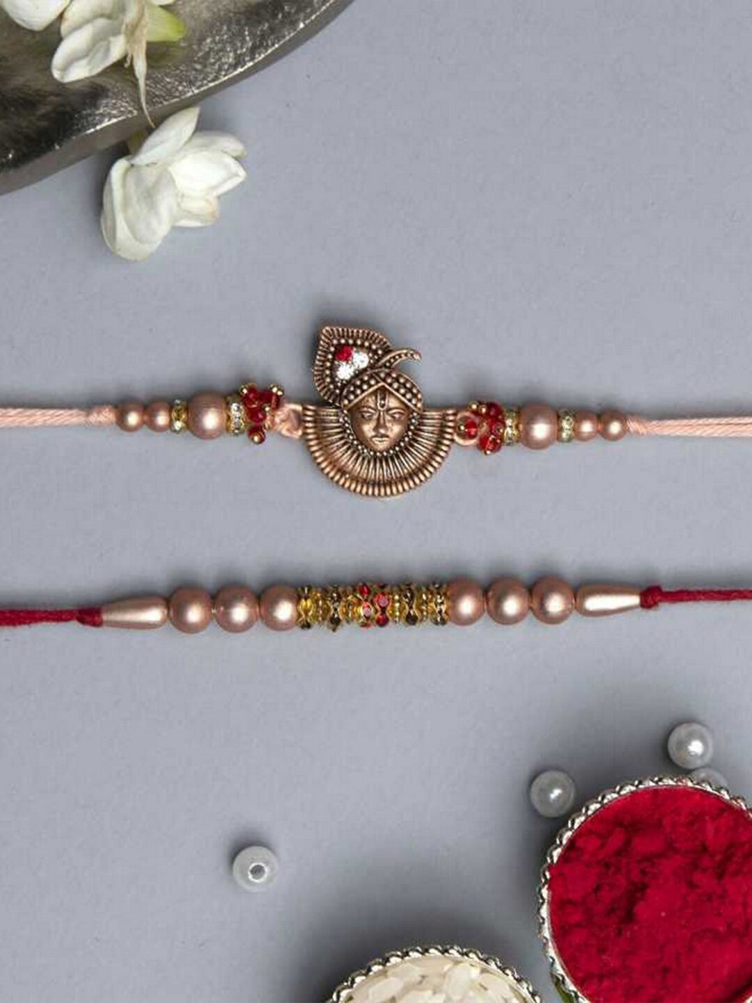 eCraftIndia Set of 2 Religious Lord Shrinathji & Beaded Rakhis With Roli Chawal