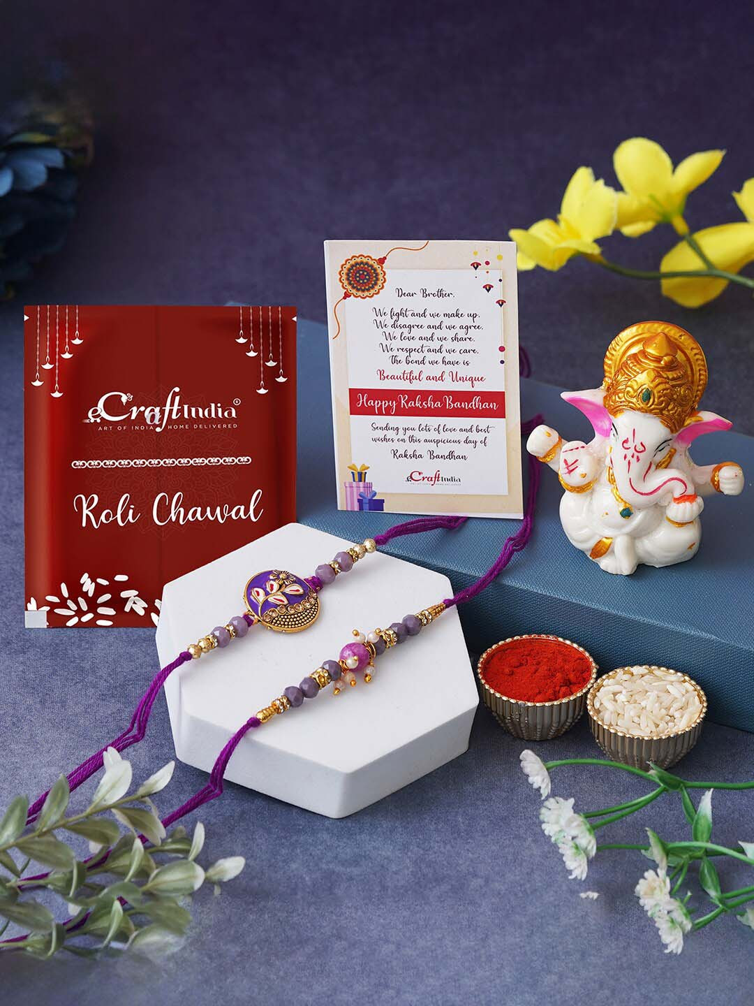 eCraftIndia Set of 2 Floral Designer Rakhis &Ganesha Idol Card Gift Set