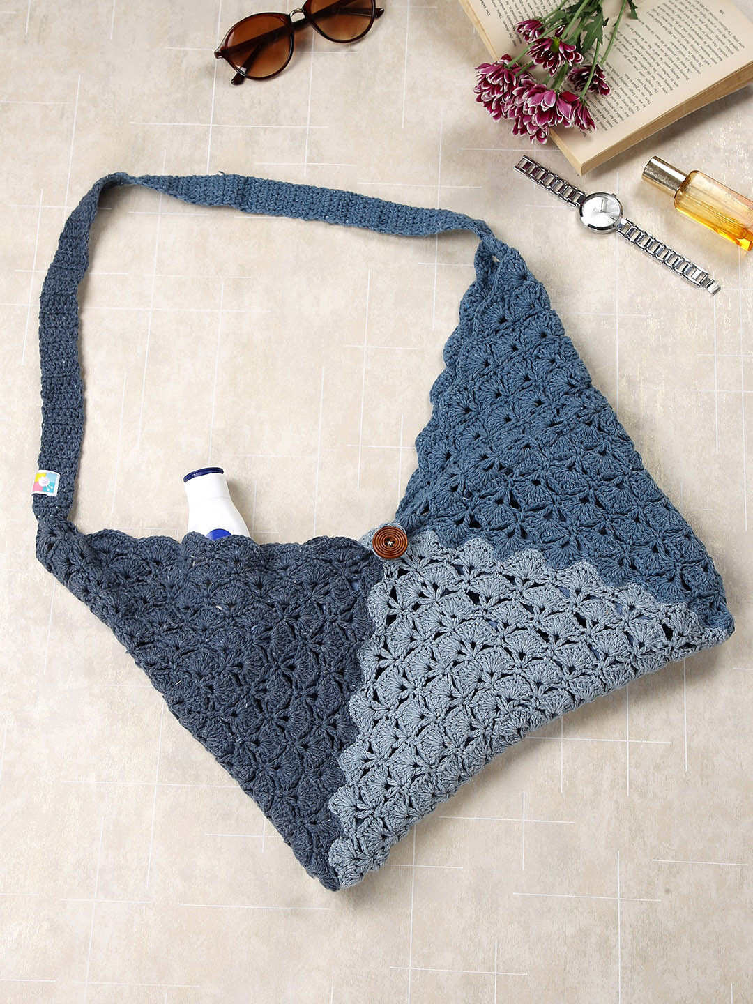 Magic Needles Swagger Textured Handheld Bag