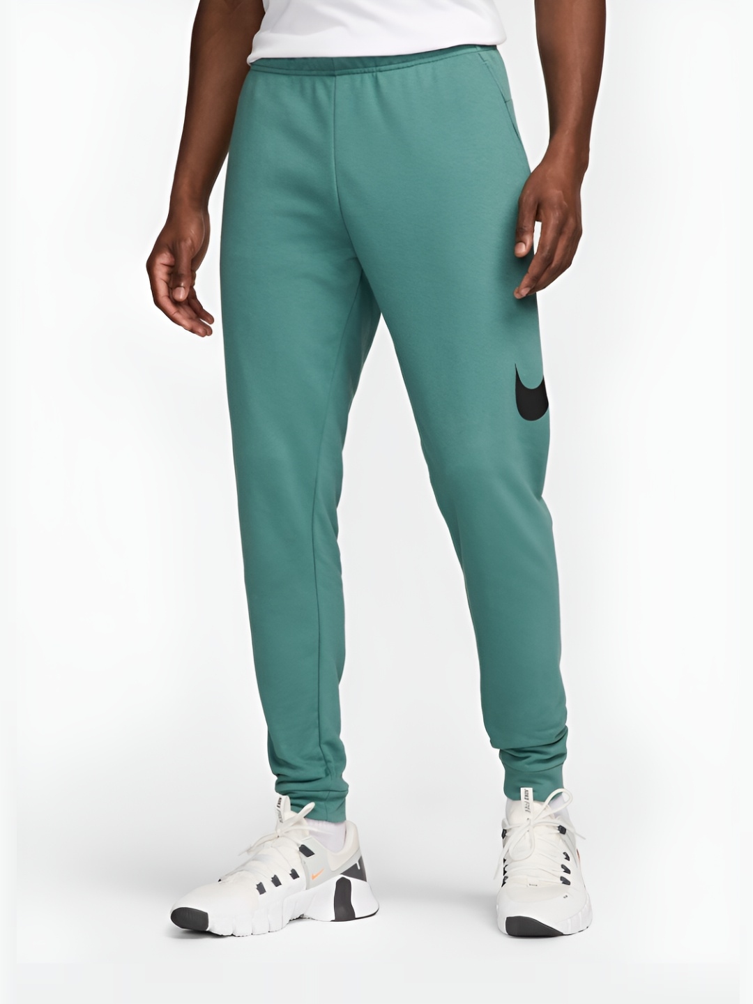 Buy Nike Dri FIT Men s Tapered Training Trousers Track Pants for Men 28465162 Myntra