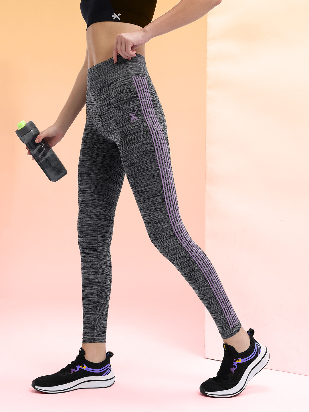 HRX by Hrithik Roshan Woman Solid Regular Fit Seamless Rapid Dry Running Tights