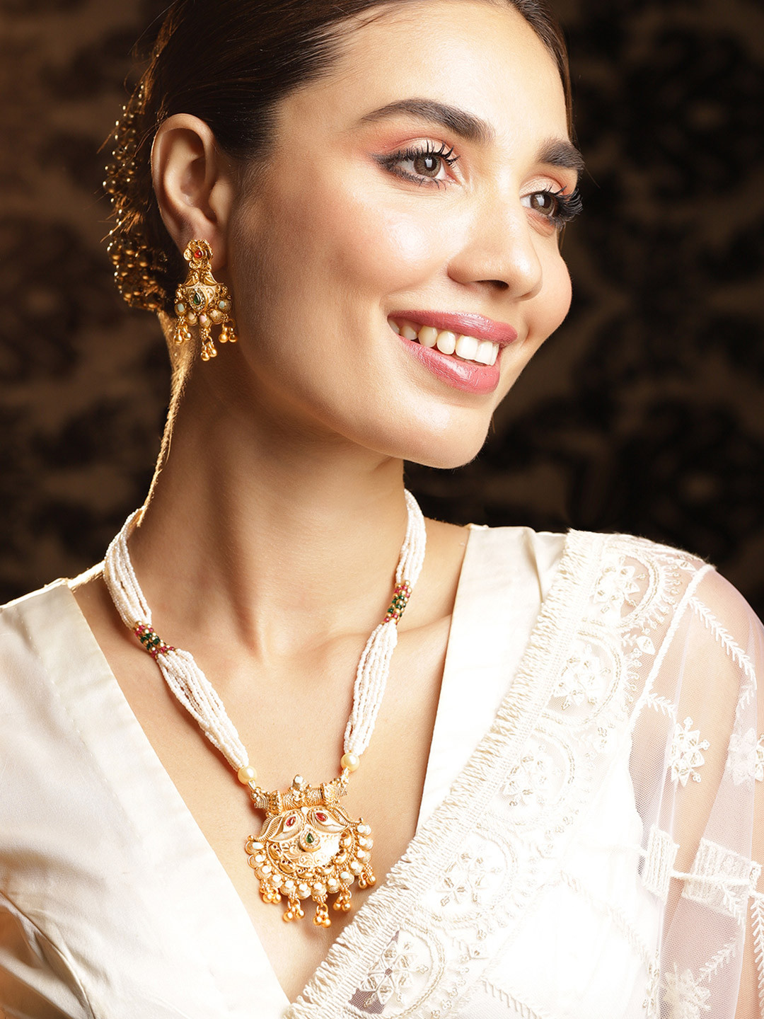 Rubans 18KT Gold Plated Antique Floral Motif AD & Emerald Studded Temple Jewellery Set