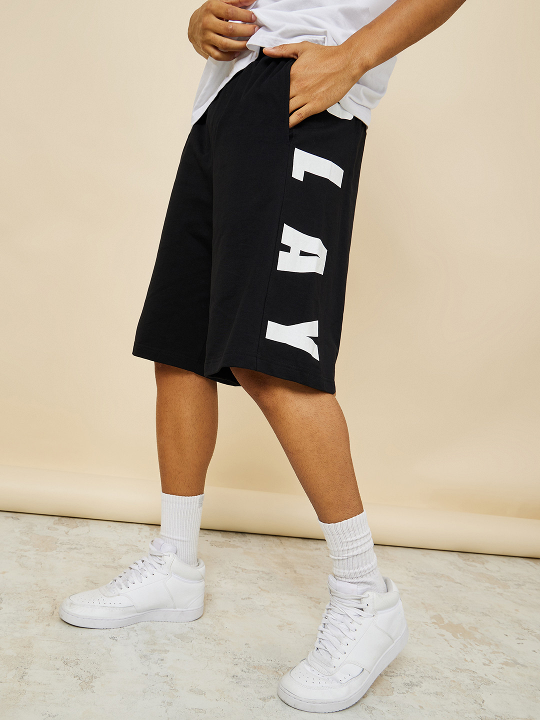 Styli Men Black Oversized Cotton Terry Shorts with Bold Text Print Detail