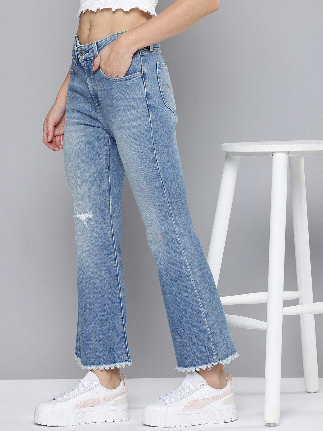 Levis Women Flared Mildly Distressed Light Fade Stretchable Jeans