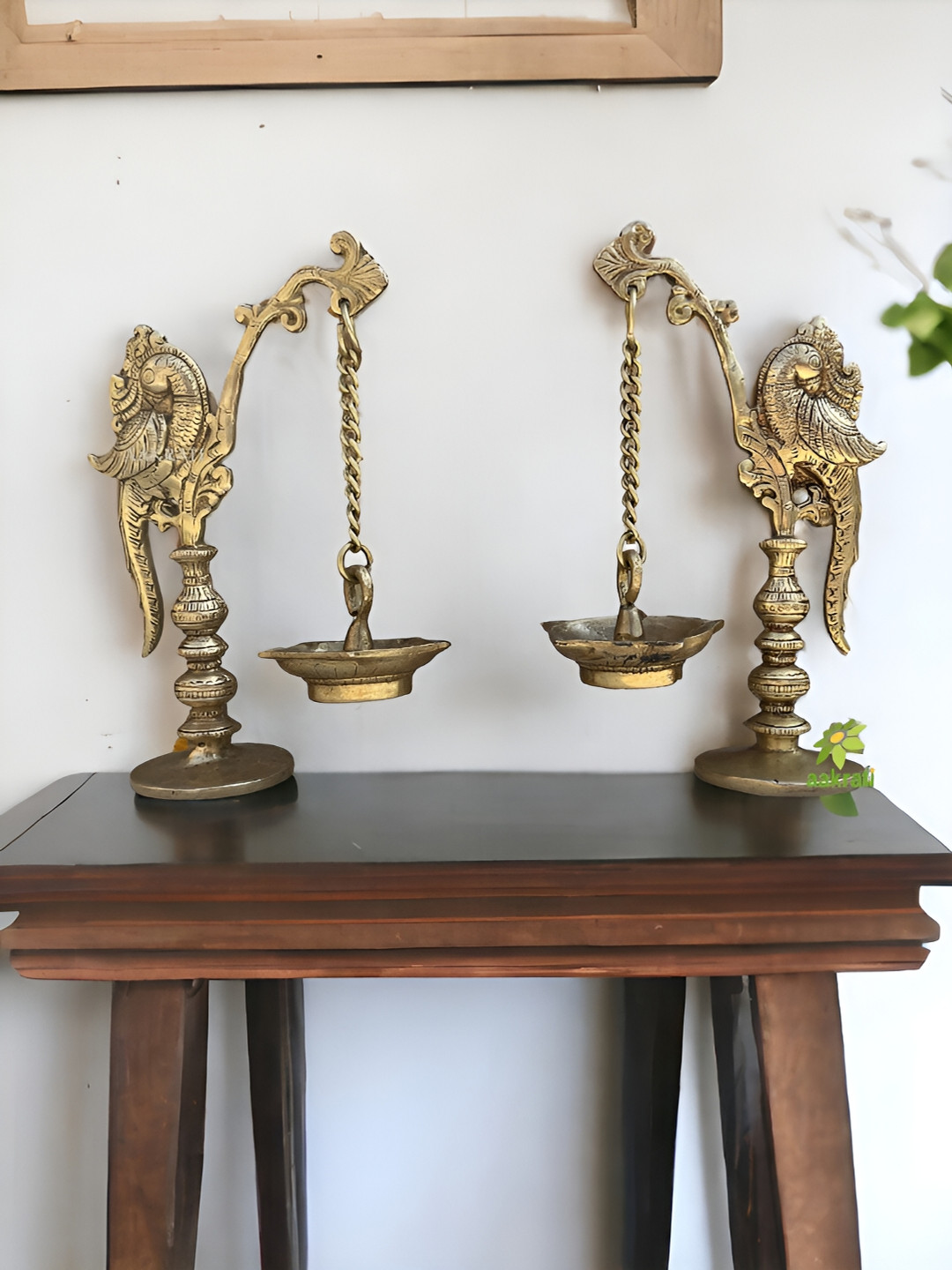 Aakrati Gold Toned 2 Pieces Brass Peacock Patterned Diya Stands