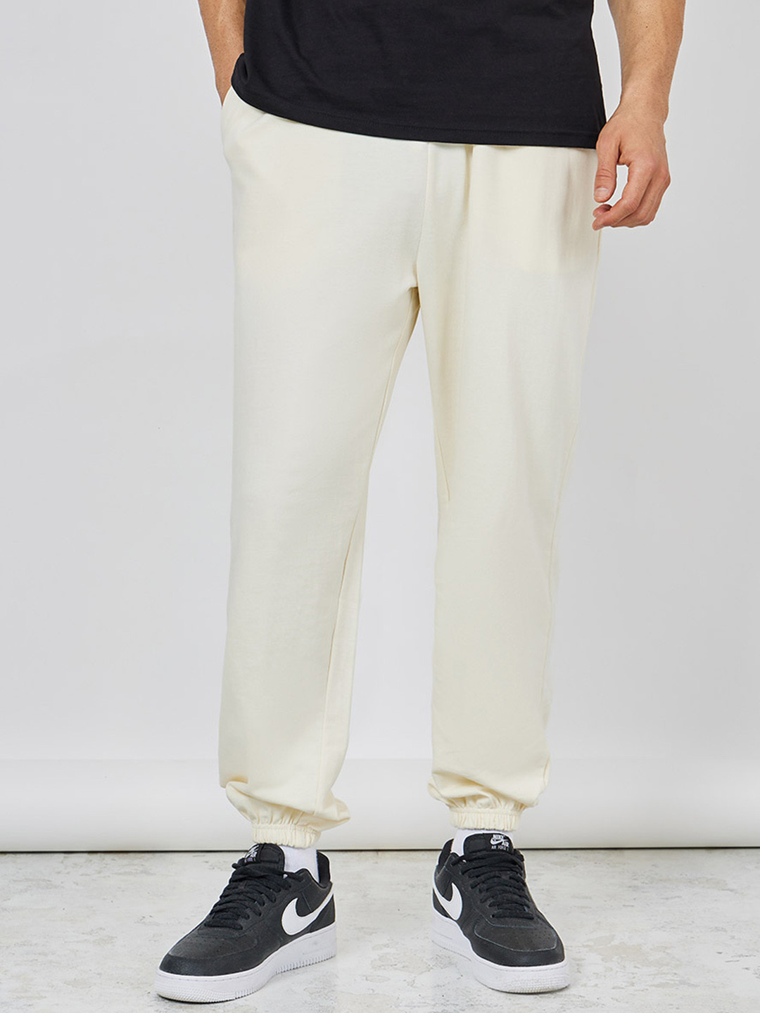 Styli Men Cream Coloured Mid-Rise Relaxed-Fit Pure Cotton Track Pants