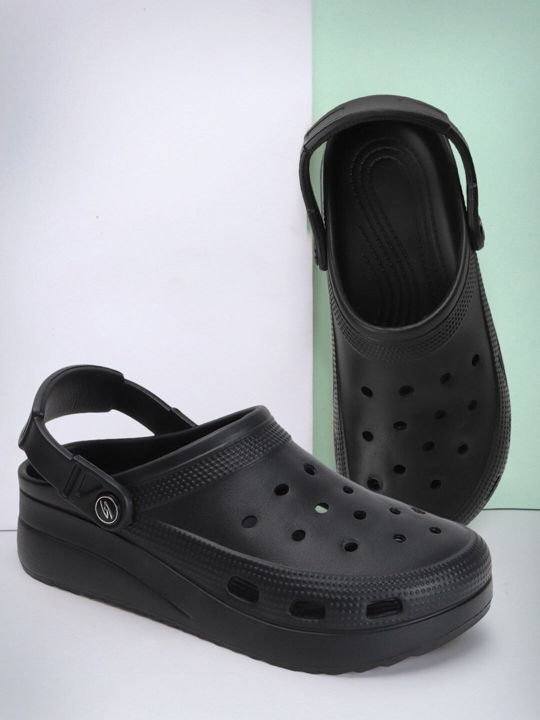 The Roadster Lifestyle Co. Women Laser Cut Clogs