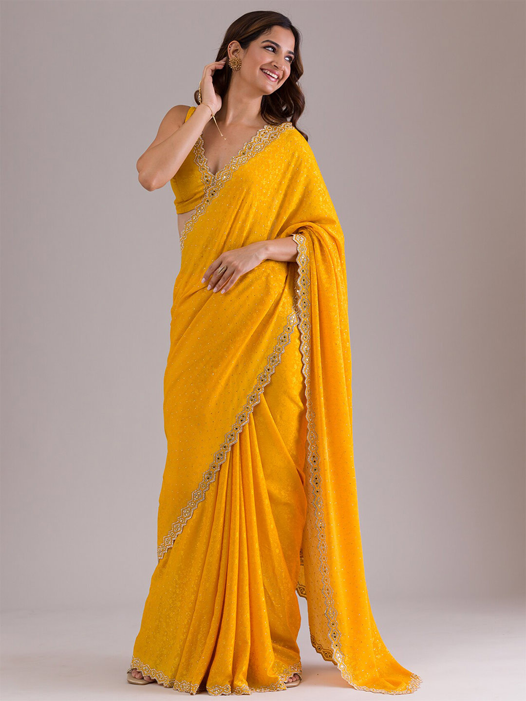 Koskii Embellished Beads and Stones Crepe Heavy Work Saree