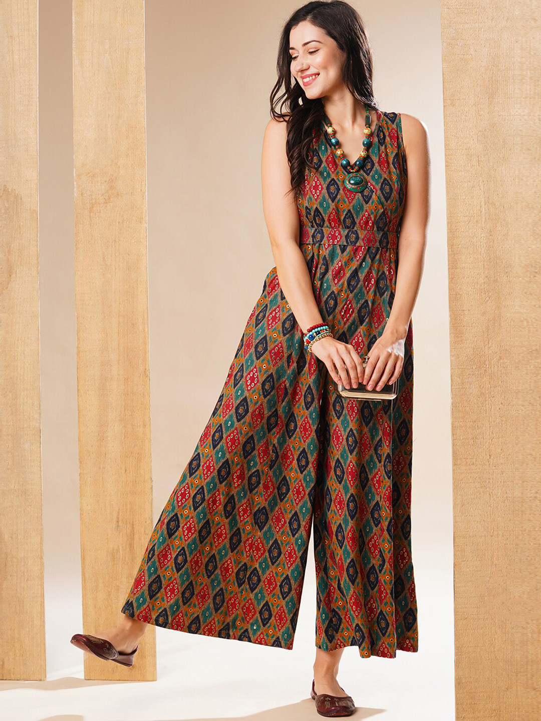 Globus Ethnic Gold Foil Printed Wrap Neck Belted Flared Leg Fusion Jumpsuit