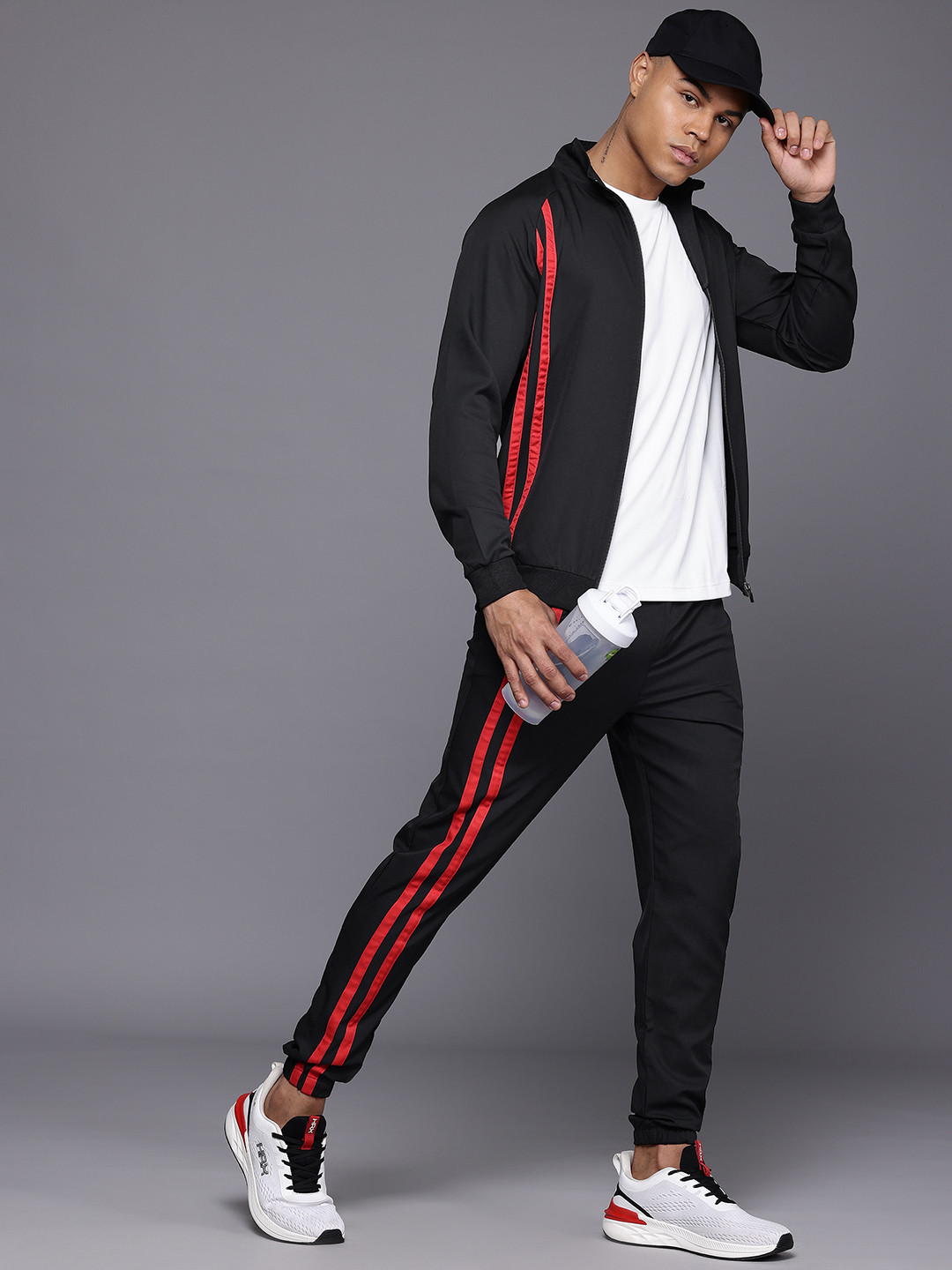 HRX by Hrithik Roshan Men Striped Rapid-Dry Sports Lifestyle Tracksuit